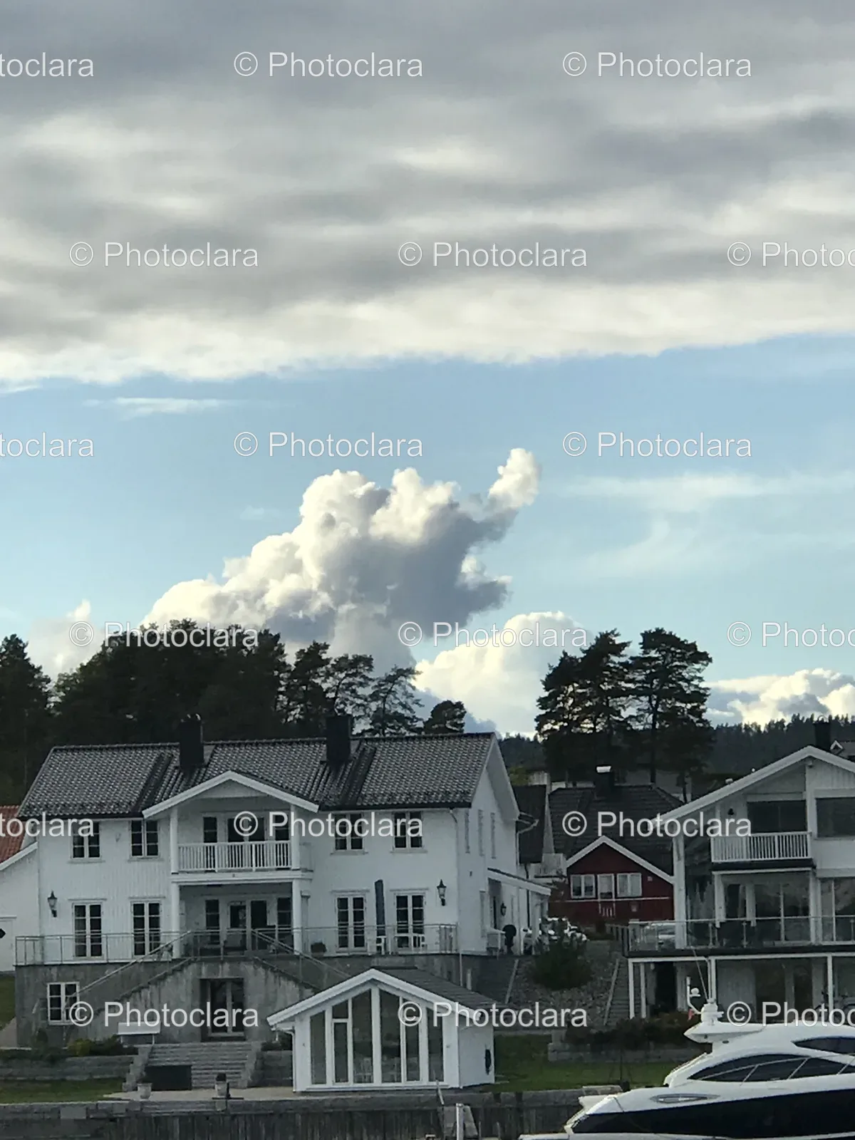 charming-suburban-homes-under-cloudy-sky.jpg