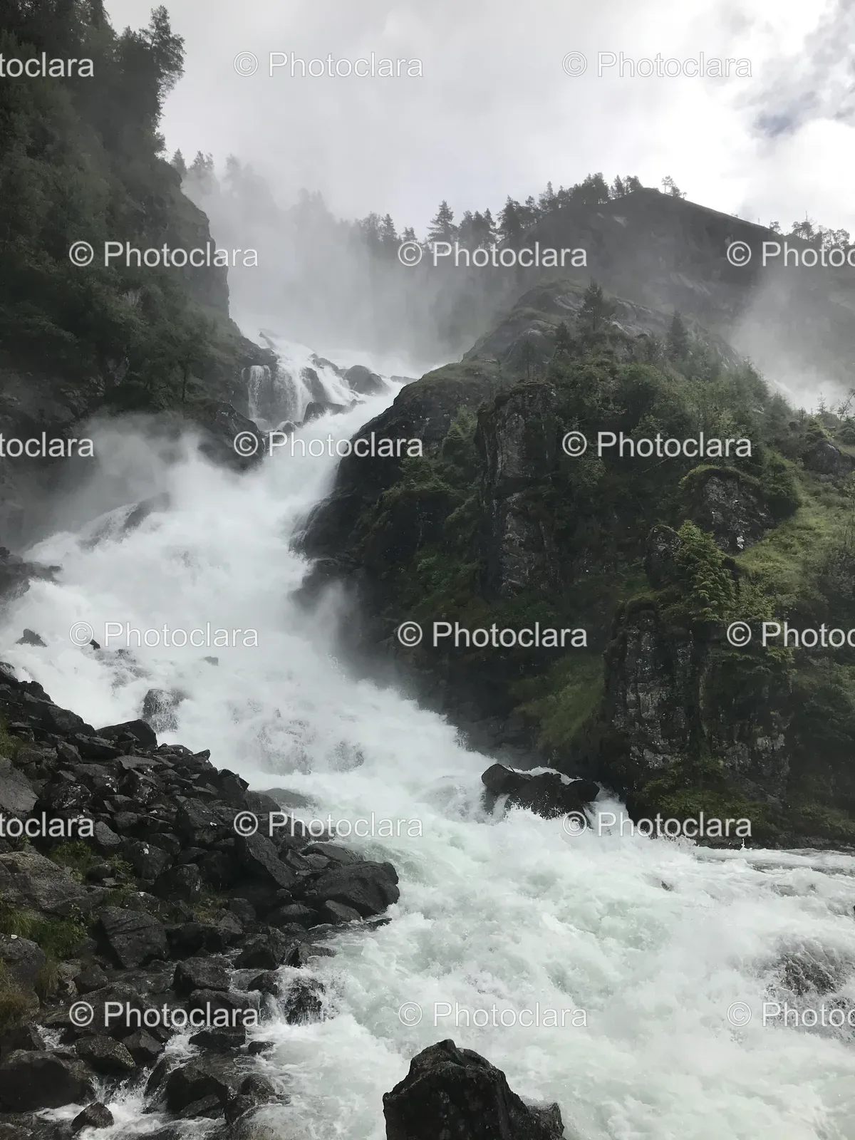 Majestic-Waterfall-Rocky-Terrain.jpg