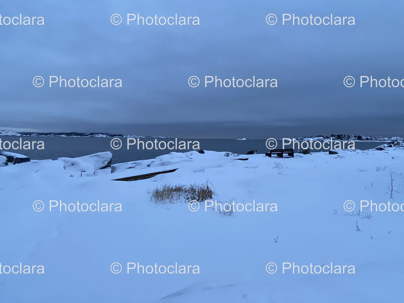 Snow-Covered-Beach-with-Bench.jpg