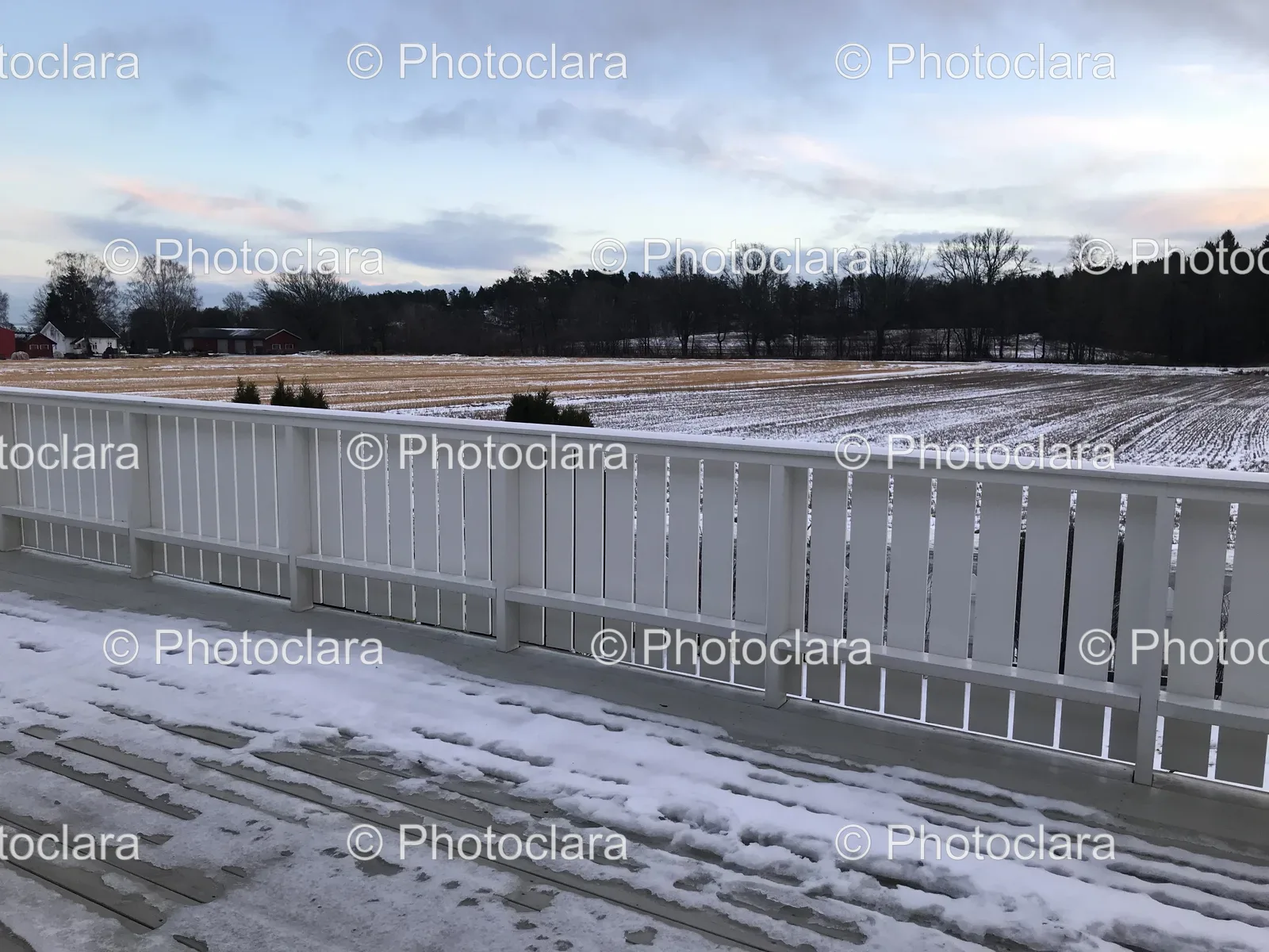 Snow-Covered-White-Railing.jpg