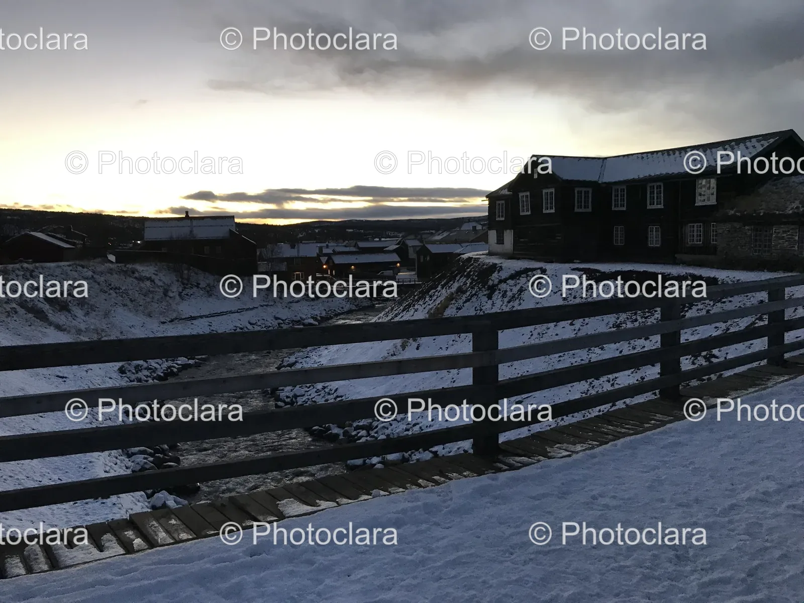 Snowy-Fence-and-Buildings.jpg