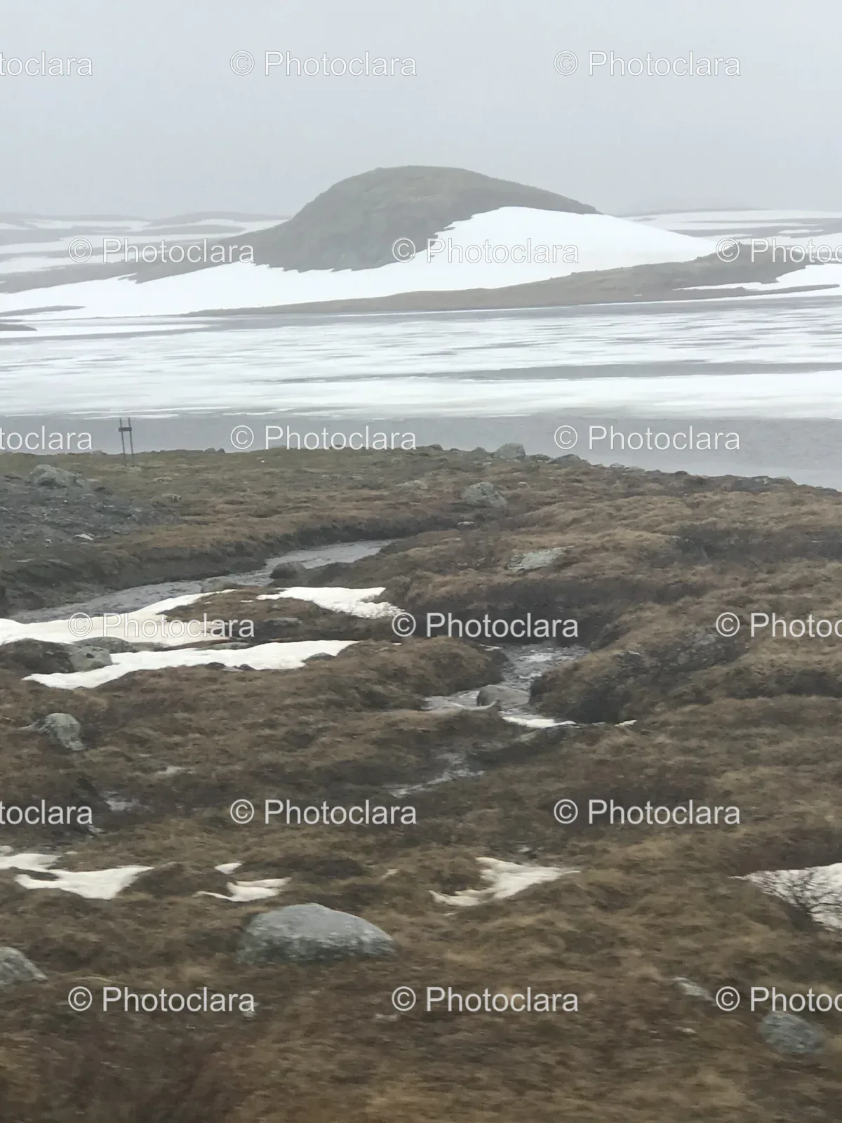 snowy-landscape-with-stream.jpg