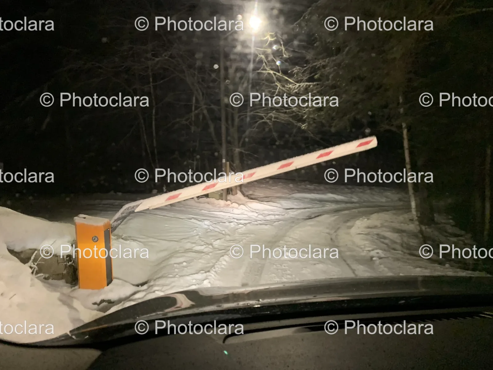 Snowy-Road-Barrier-at-Night.jpg