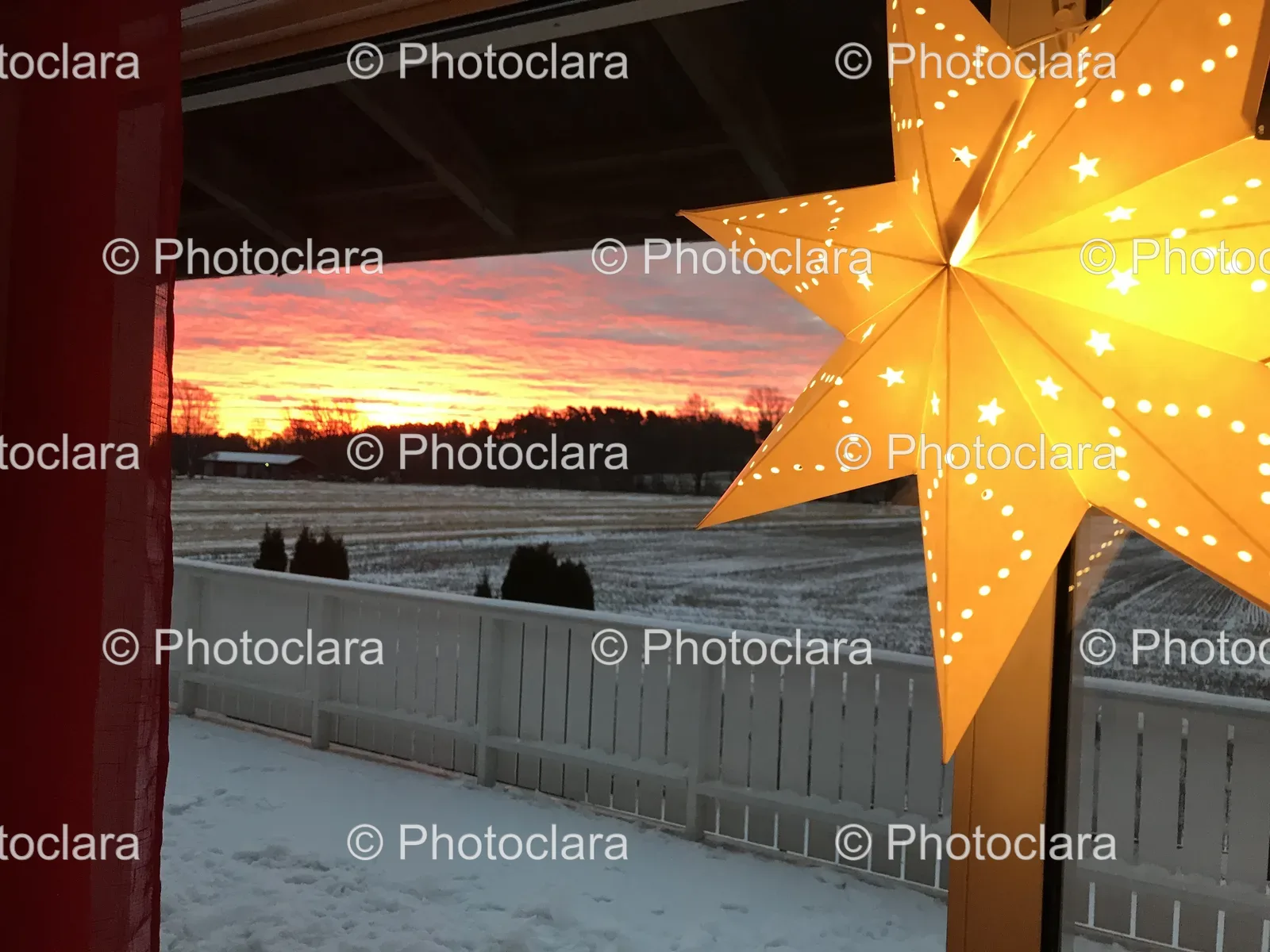 Star-with-Lights-Outside-a-Winter-Window.jpg