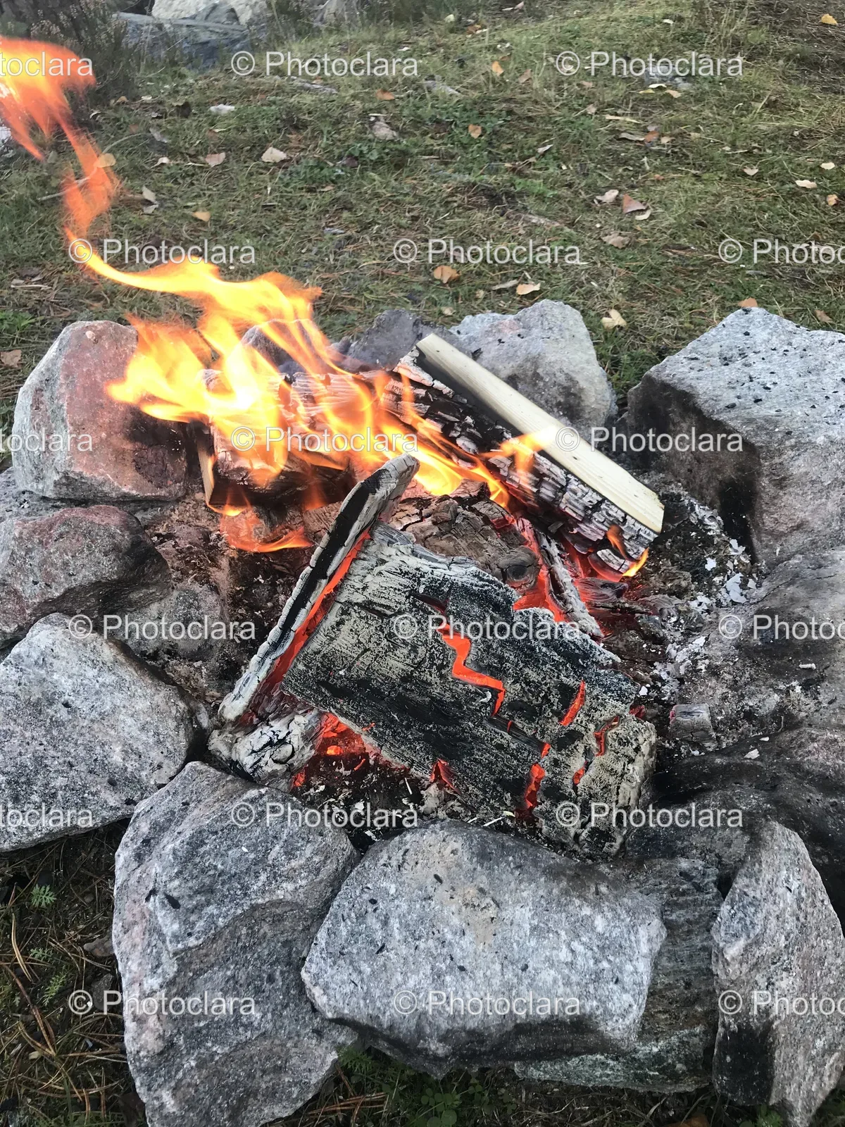 blazing-fire-pit-with-rocks.jpg
