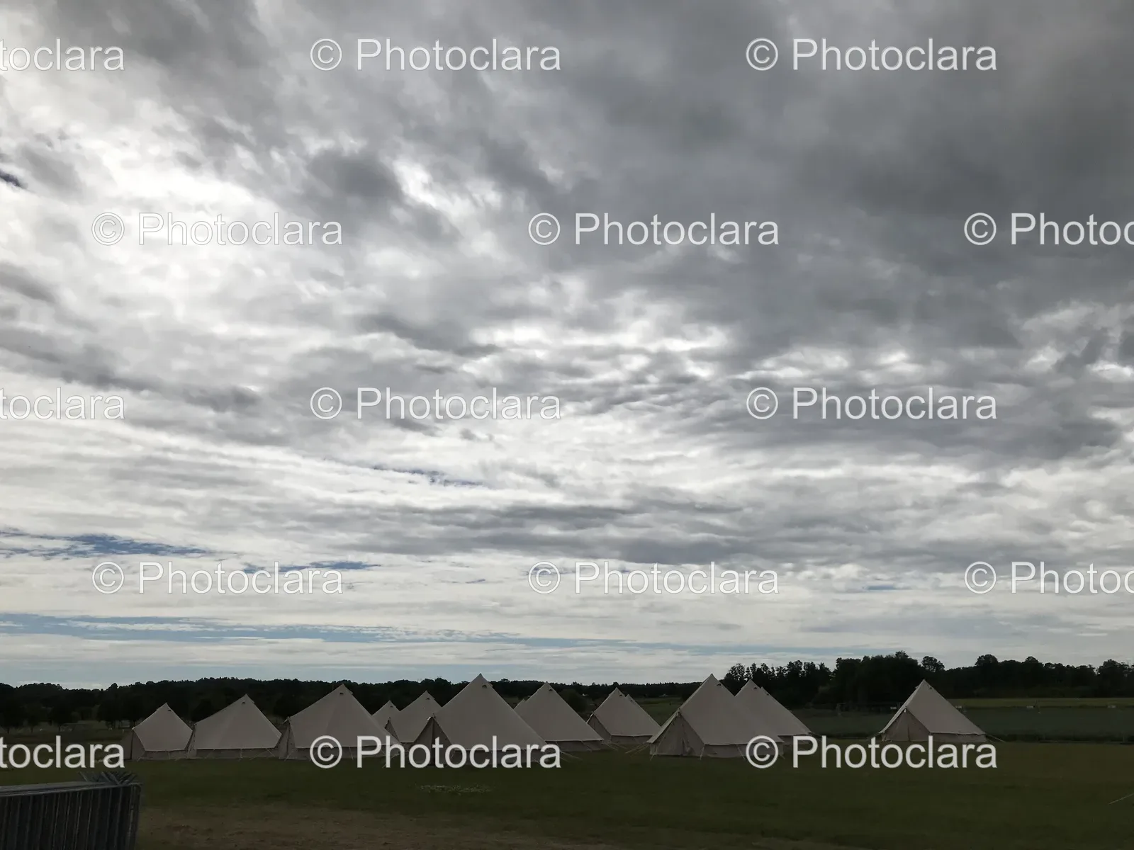 group-of-tents-in-a-green-field.jpg
