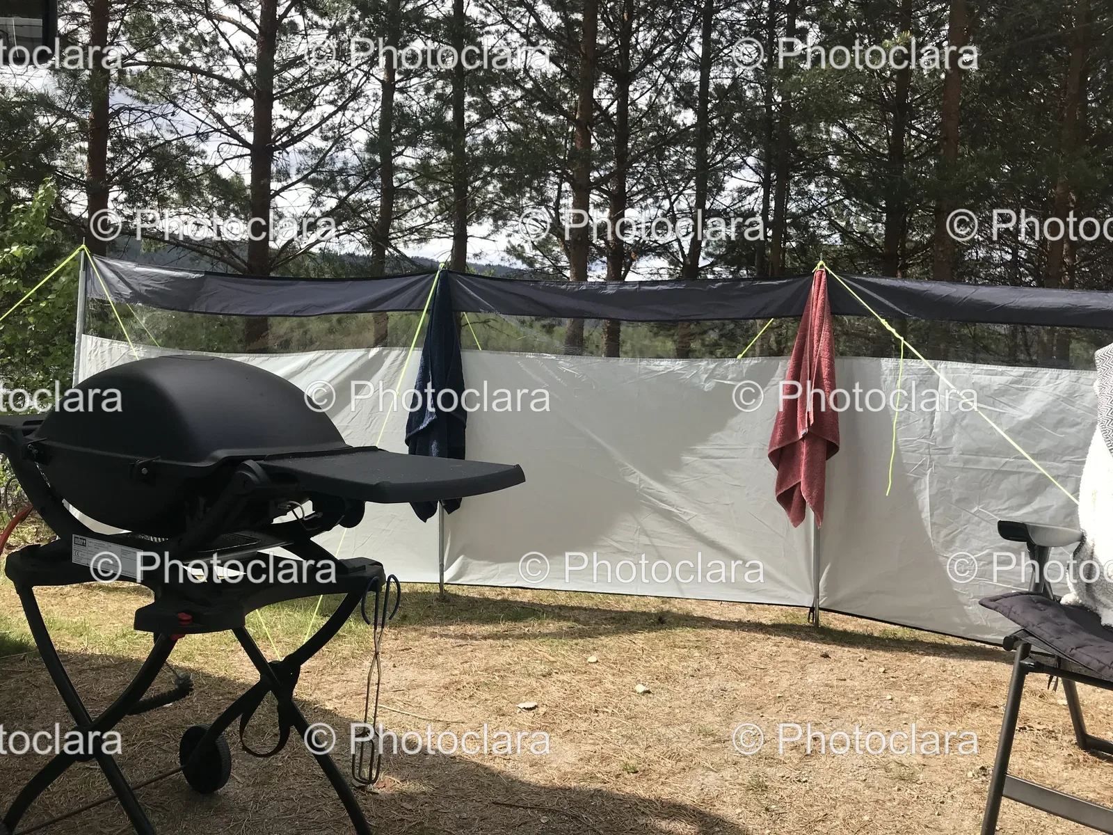 Outdoor-Camping-Setup-With-Grill-And-White-Tent.jpg