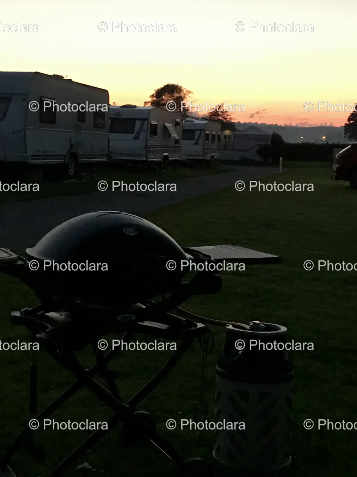 Grill-on-Stand-in-Grass-Field.jpg