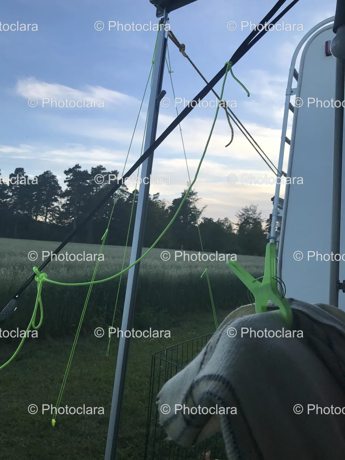 green-ropes-blanket-on-pole.jpg