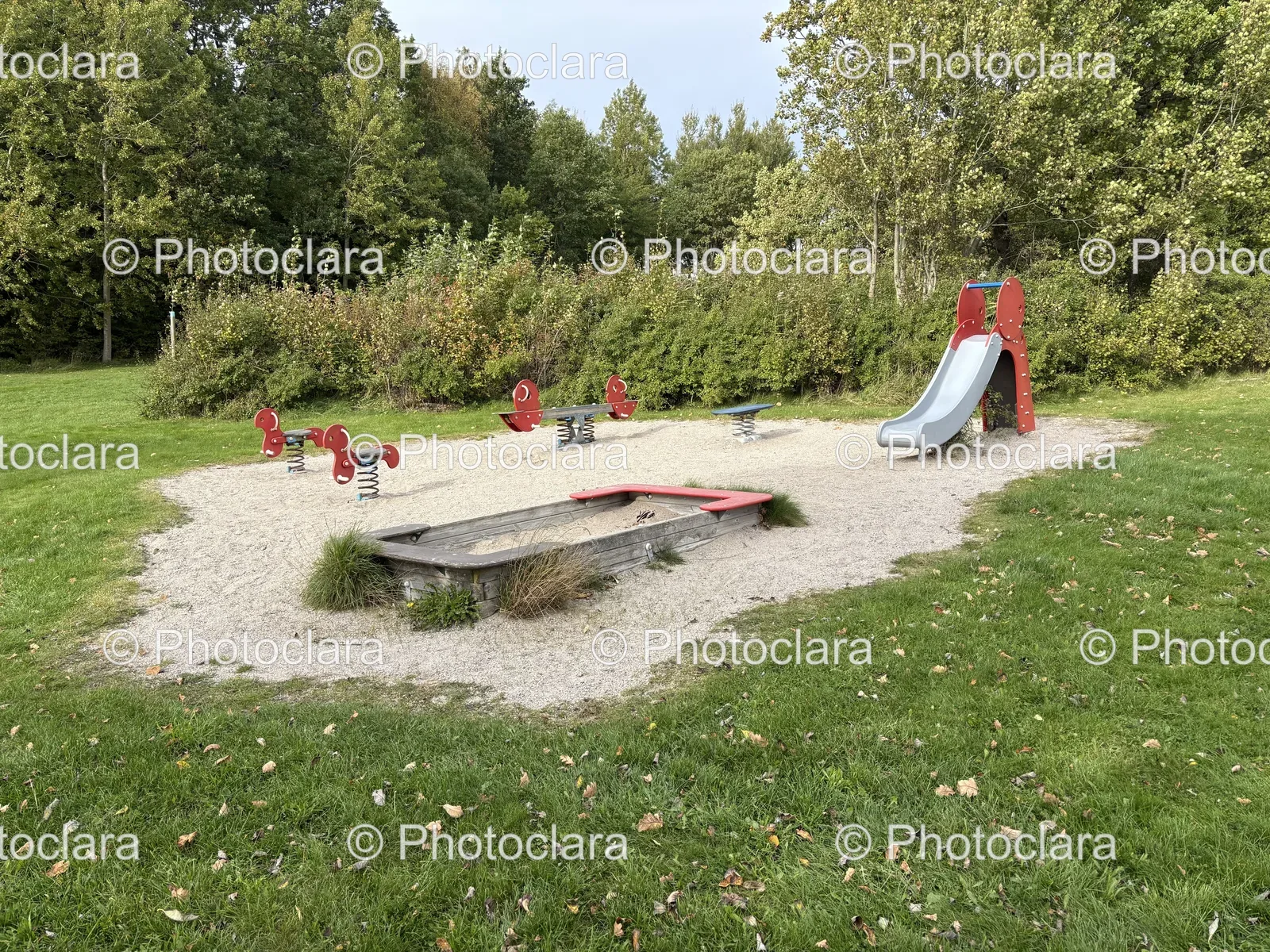 sunny-playground-sandbox-slide.jpg