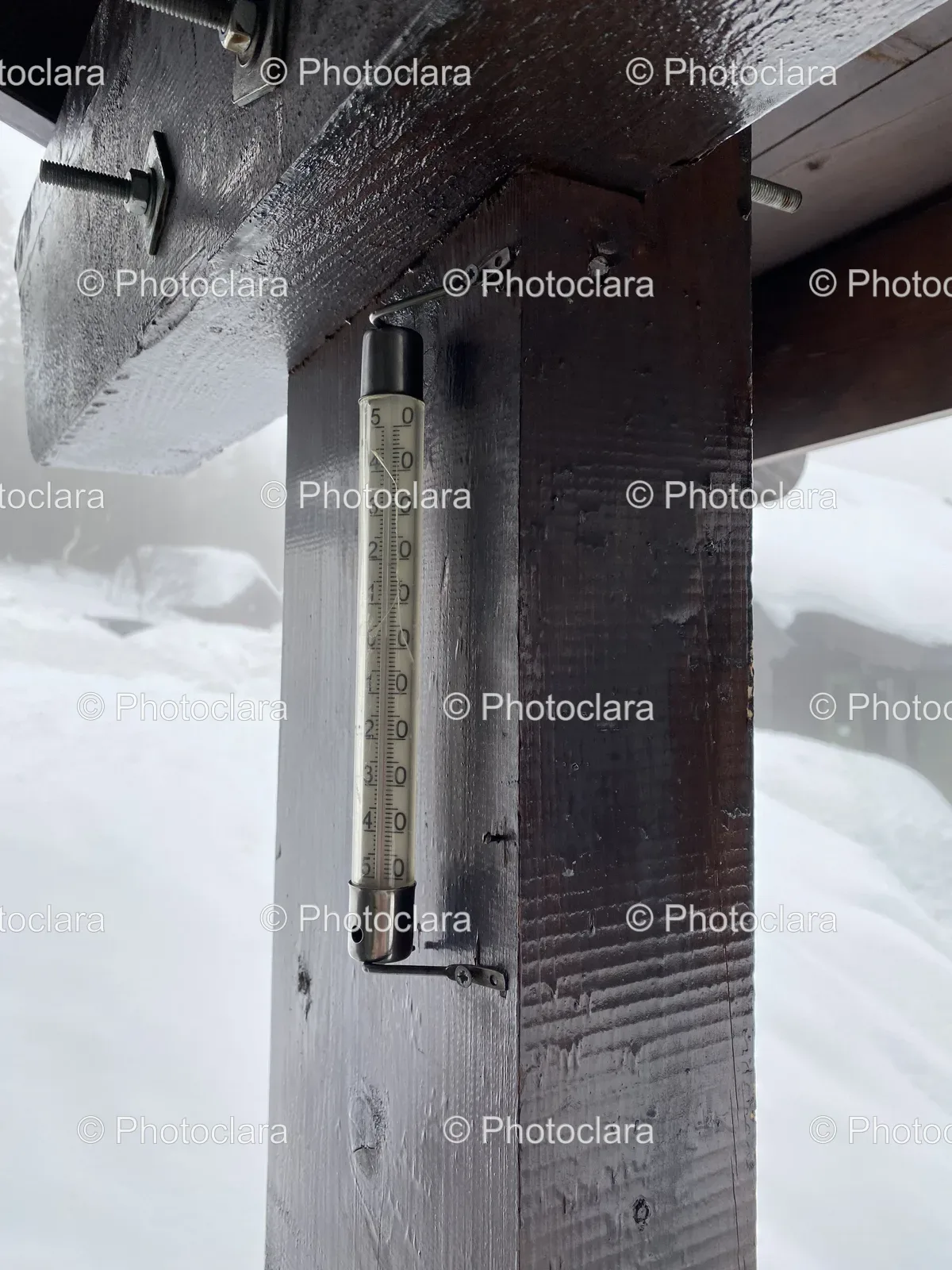 Thermometer-on-a-Snowy-Wood-Post.jpg