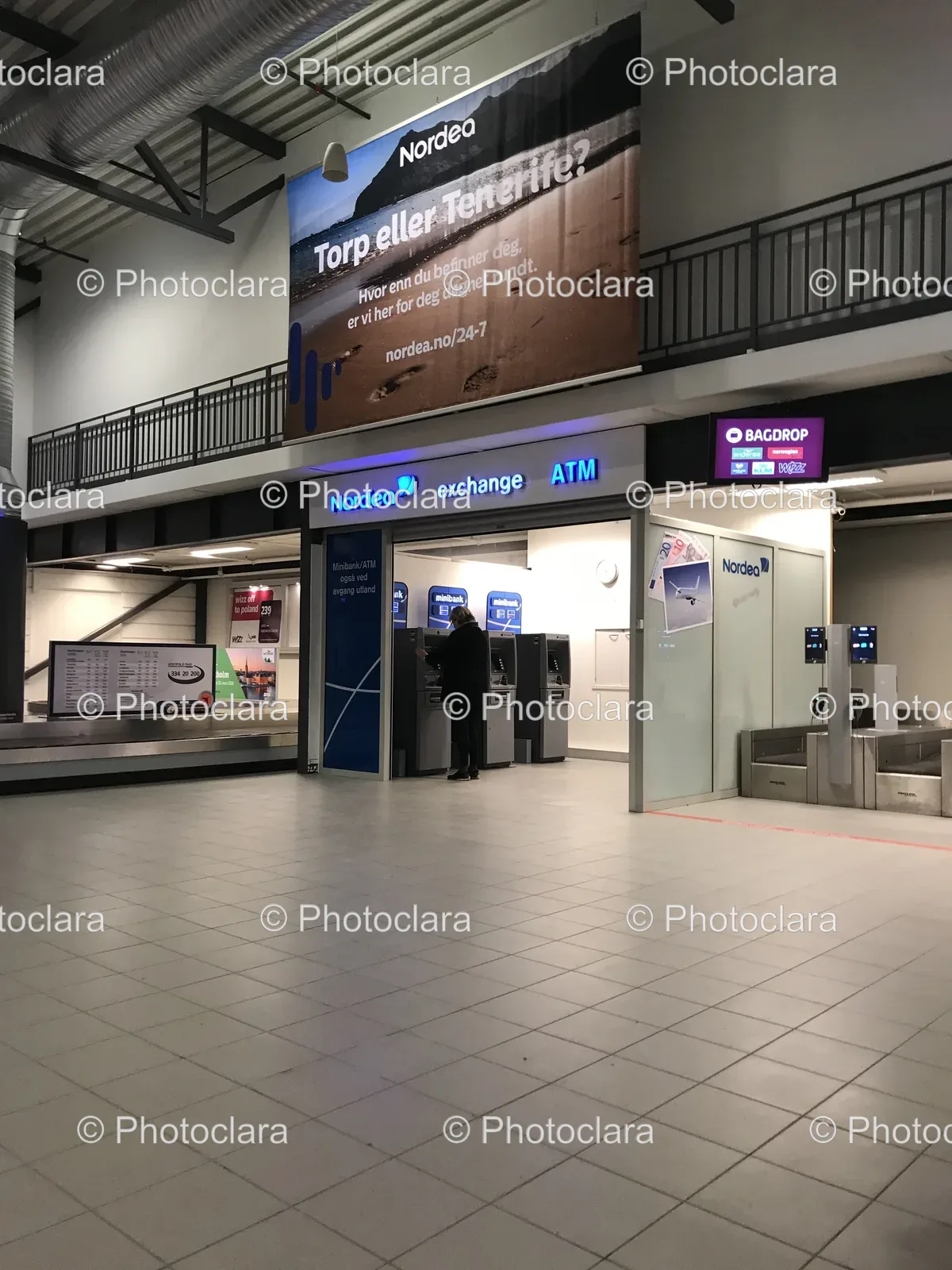 Person-Standing-in-Front-of-Nordea-ATM.jpg
