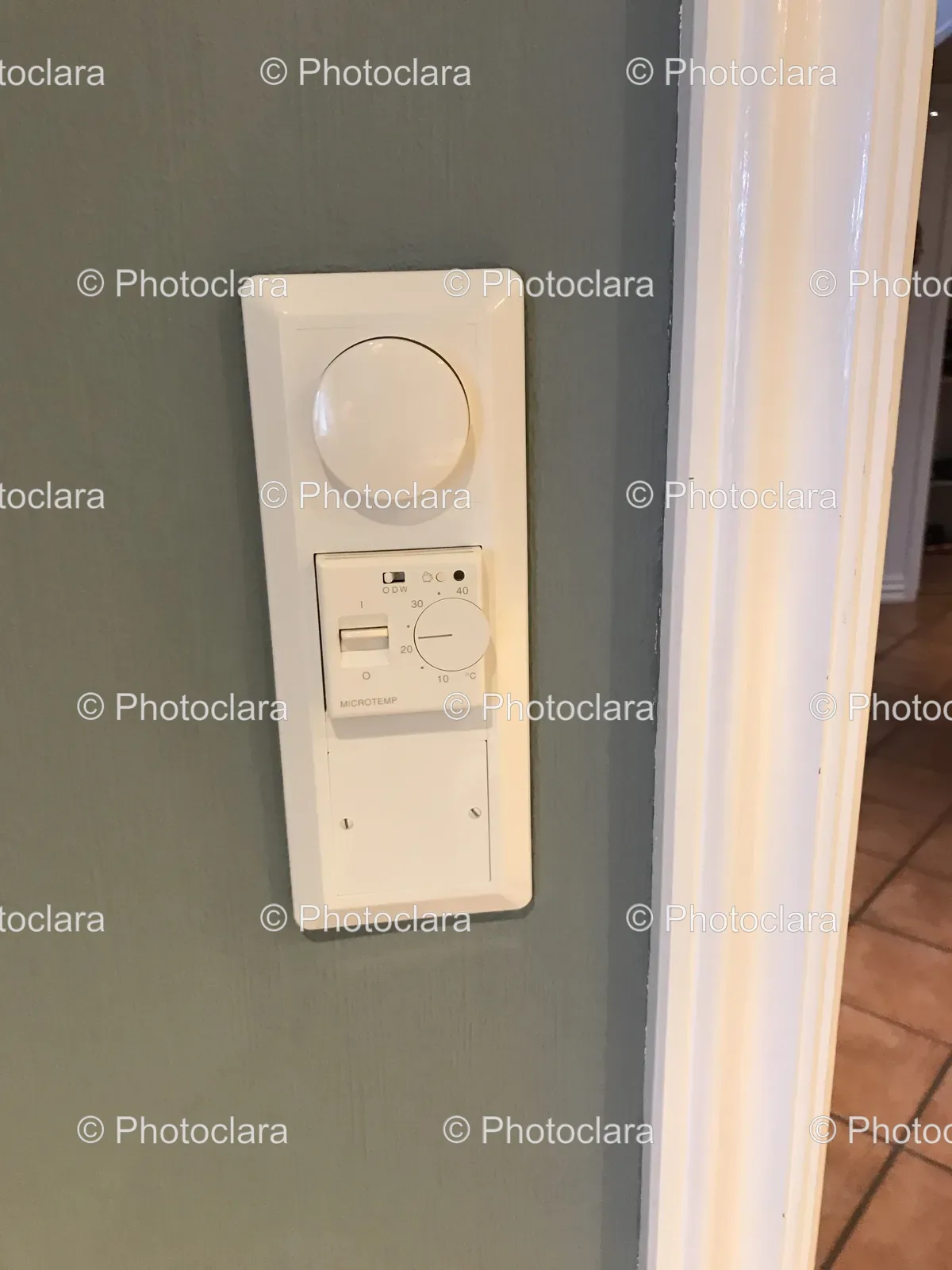 Rectangular-Device-with-Knobs-on-Wall.jpg