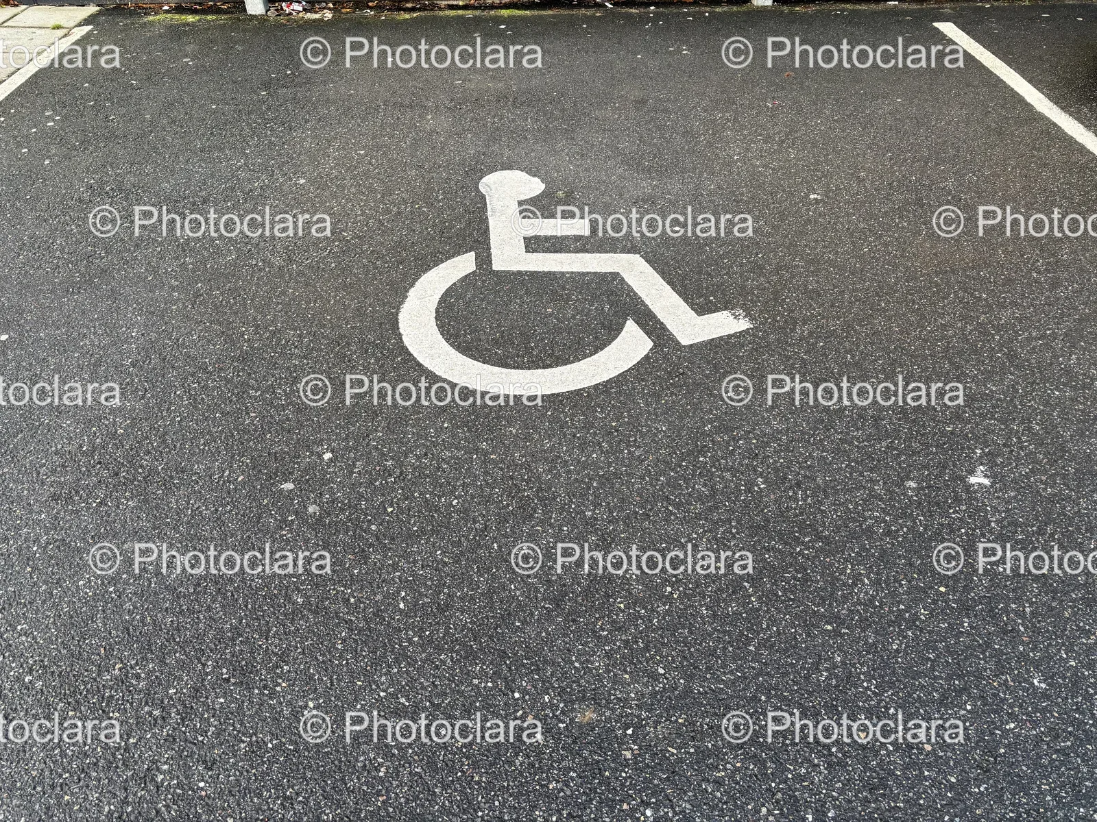 parking-lot-sign-painted-on-asphalt.jpg