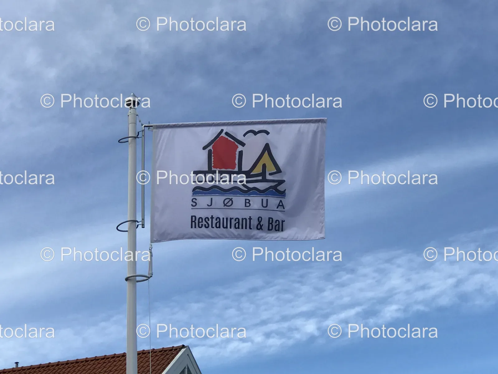 Flag-on-a-Pole-Outside-Sjbua-Restaurant-Bar.jpg