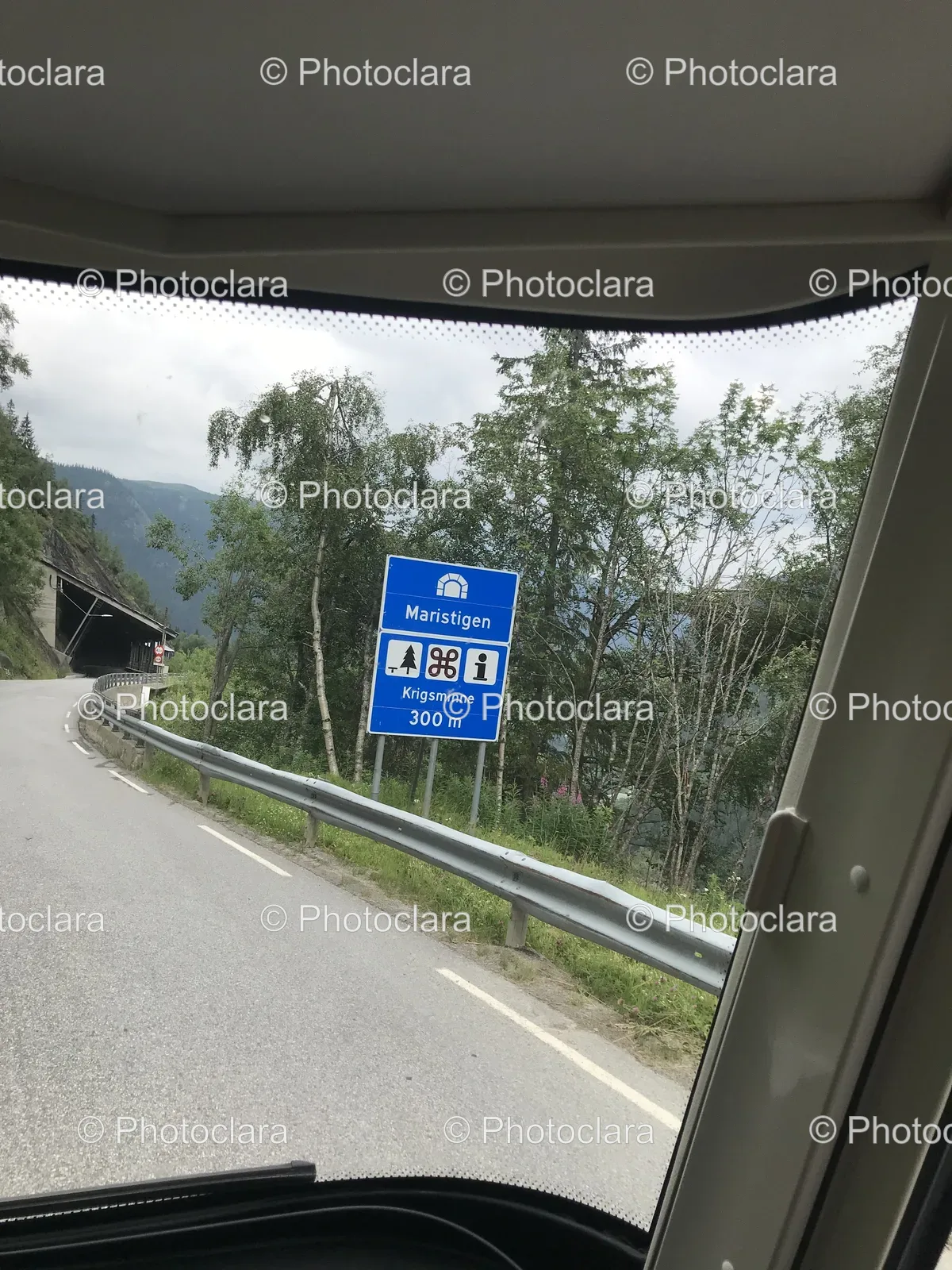 Road-With-A-Blue-Sign-Beside.jpg