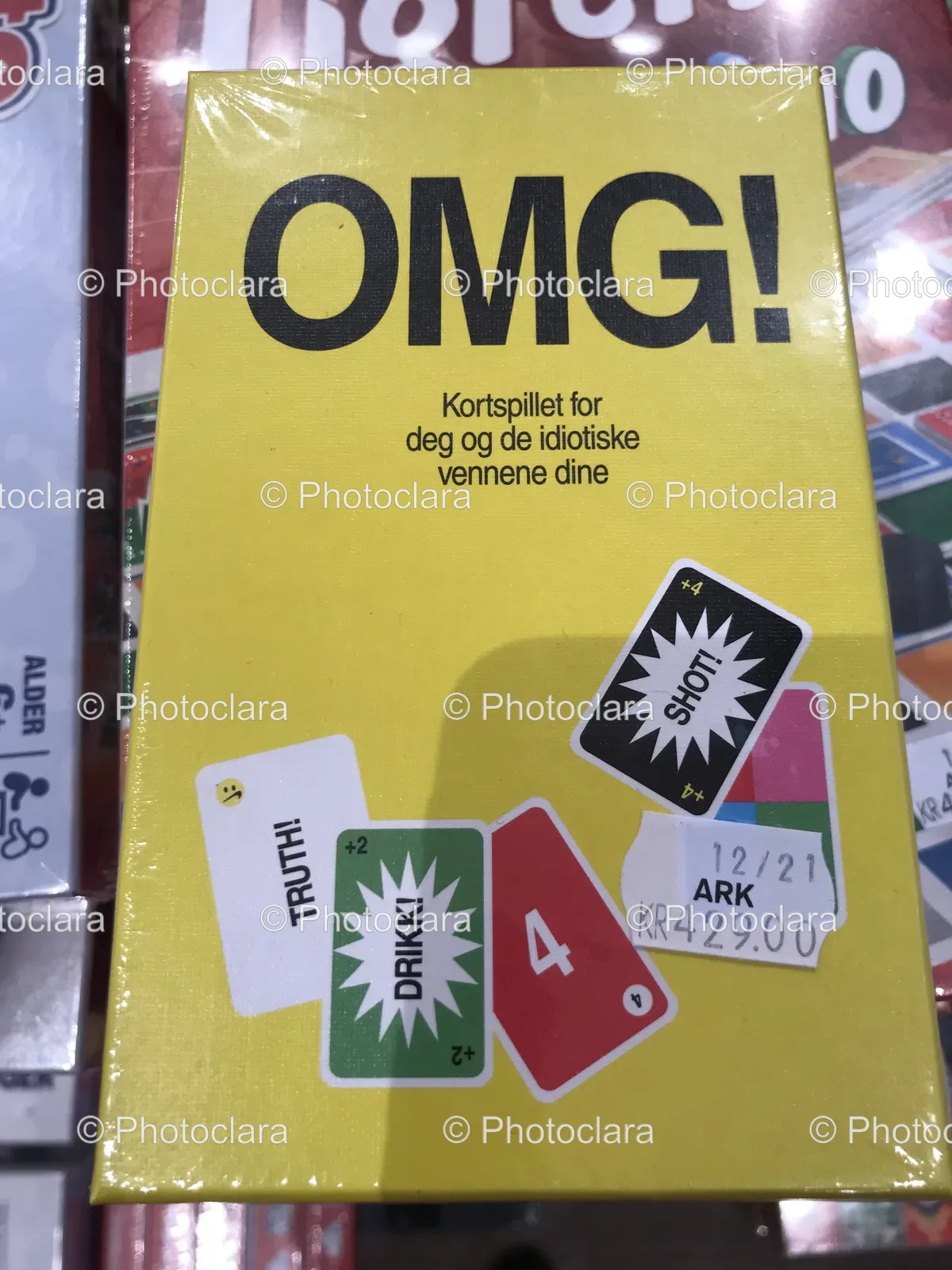 yellow-box-with-black-text-and-stickers.jpg