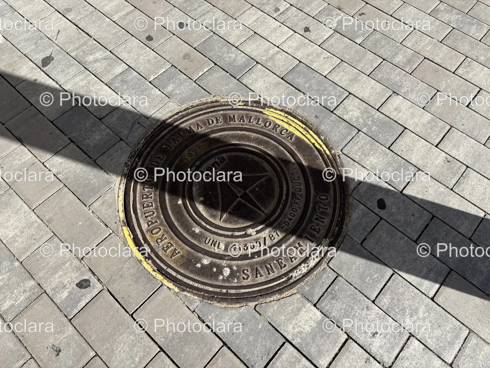 Mallorca-Manhole-Cover-on-Brick.jpg