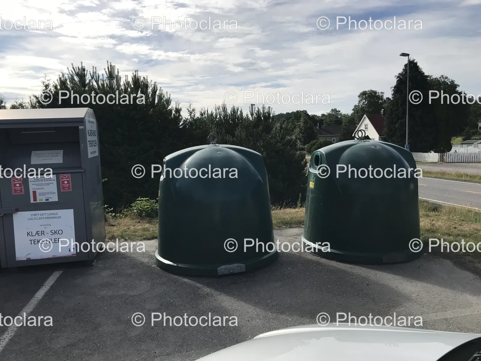 Green-Bins-Next-to-Grey-Container.jpg