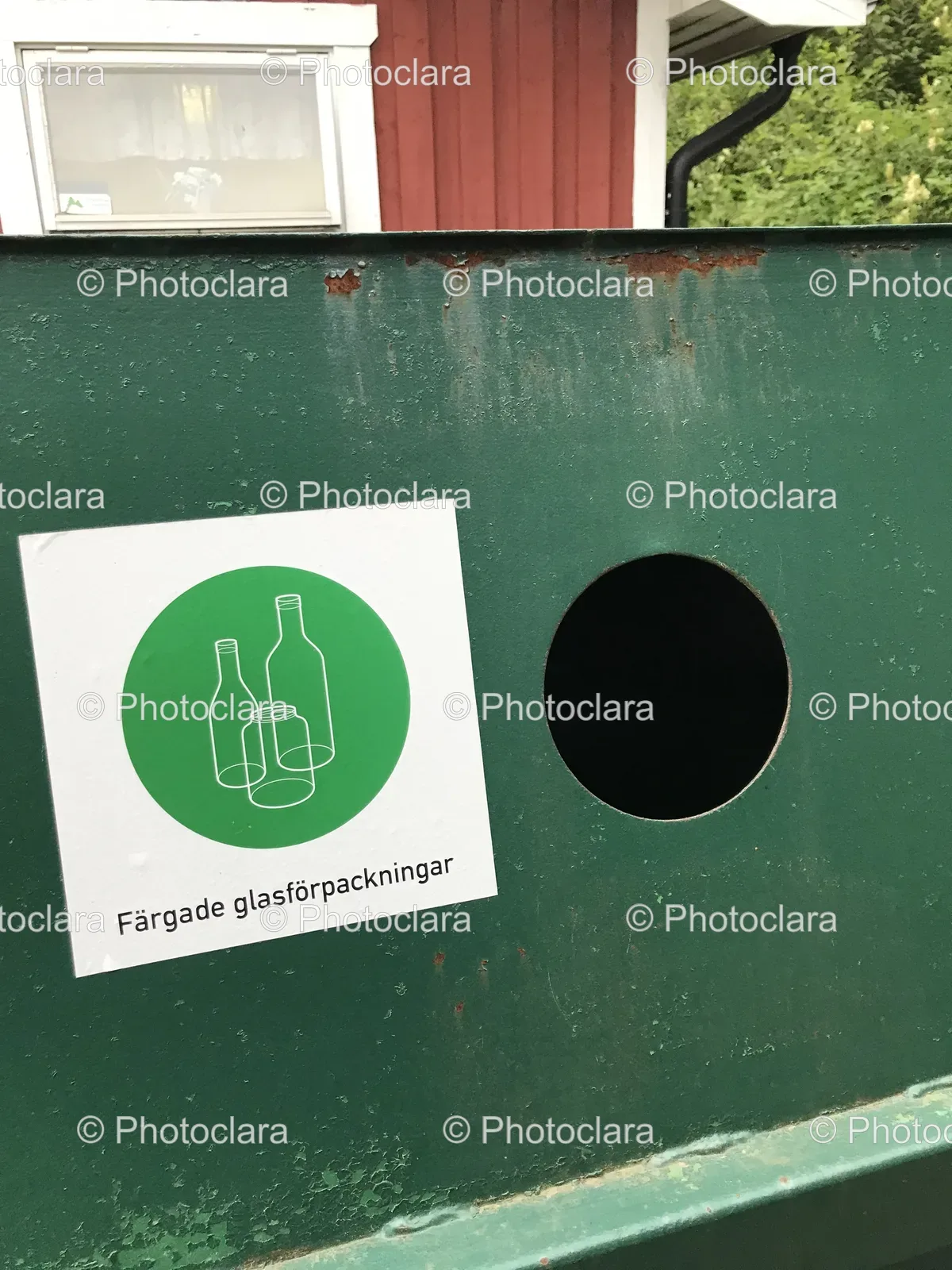 Green-Metal-Container-with-White-Sign.jpg
