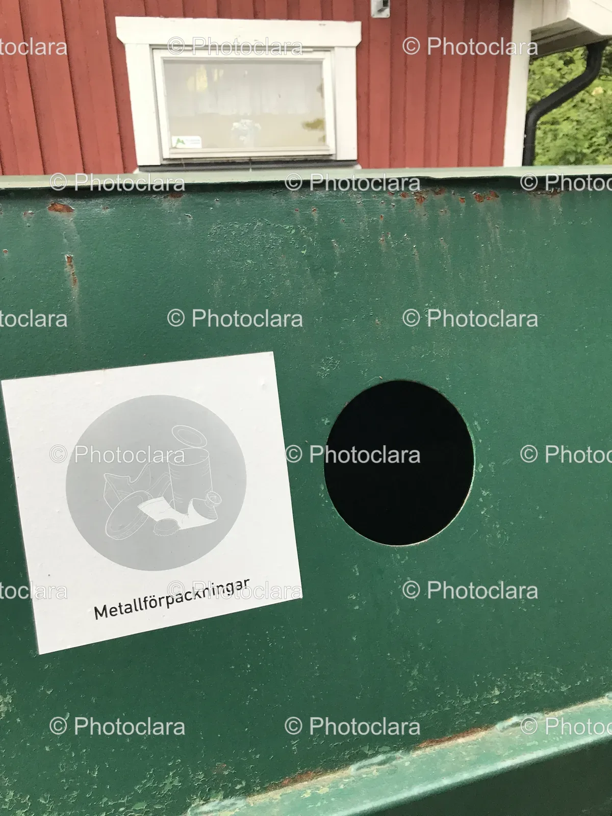 green-metal-recycling-bin-with-label.jpg