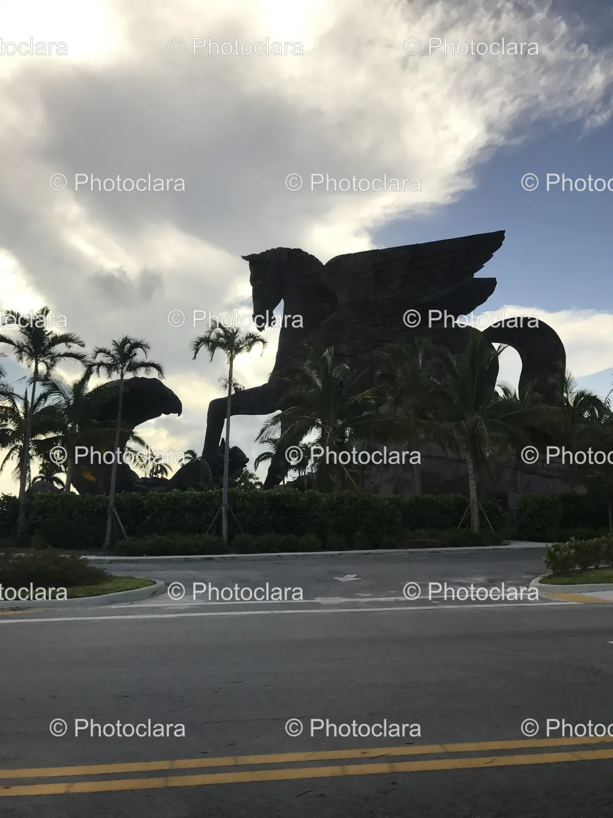 Majestic-Winged-Horse-Statue-with-Palm-Tree.jpg