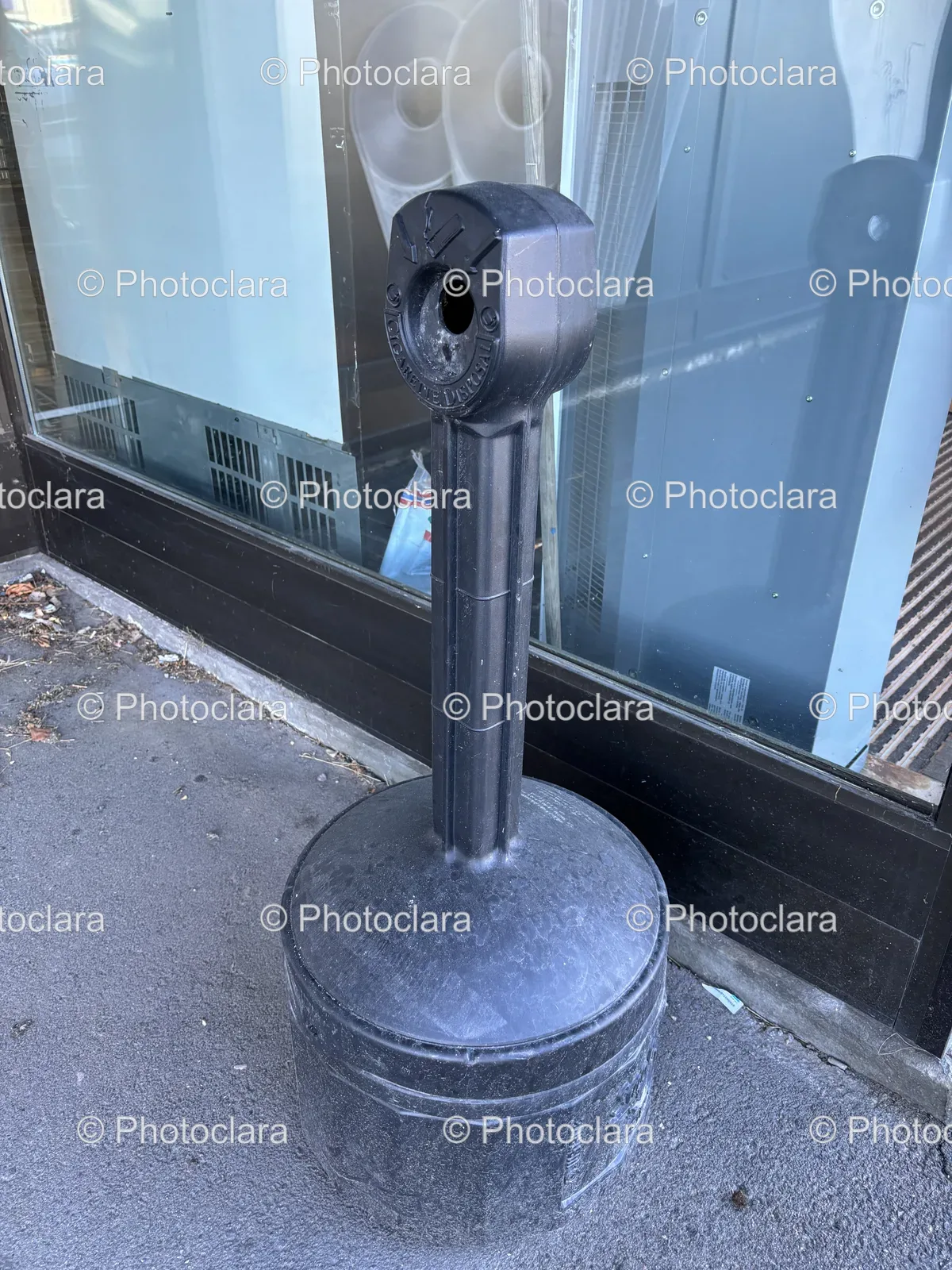 broken-black-object-on-sidewalk.jpg
