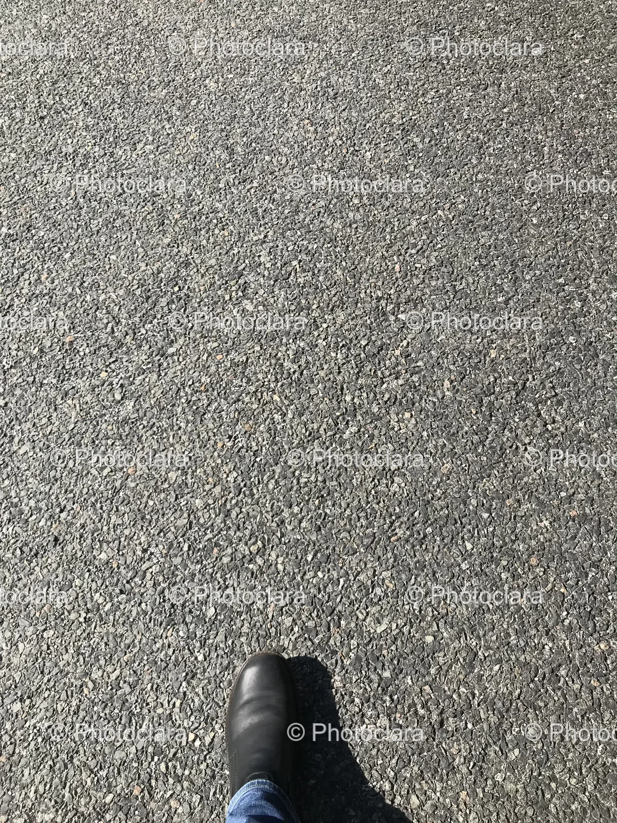 Foot-on-Road-with-Shadow.jpg
