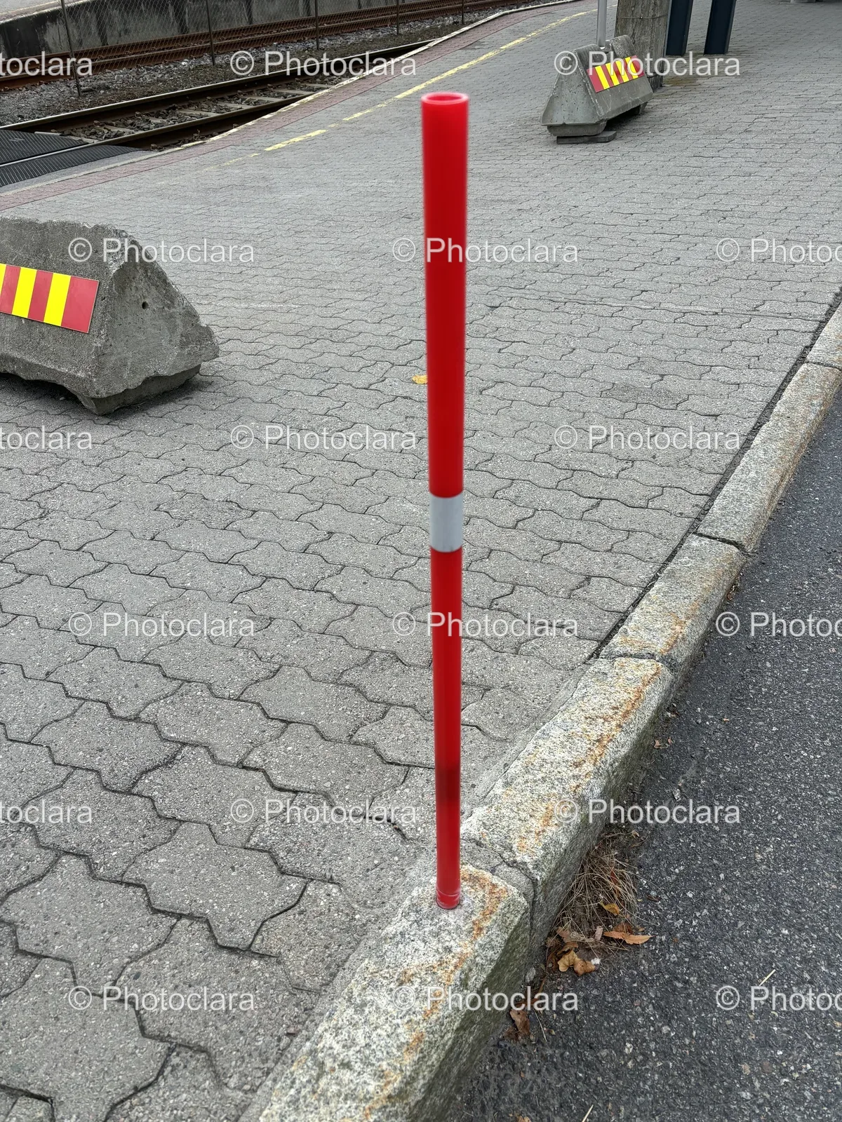 red-pole-on-sidewalk.jpg