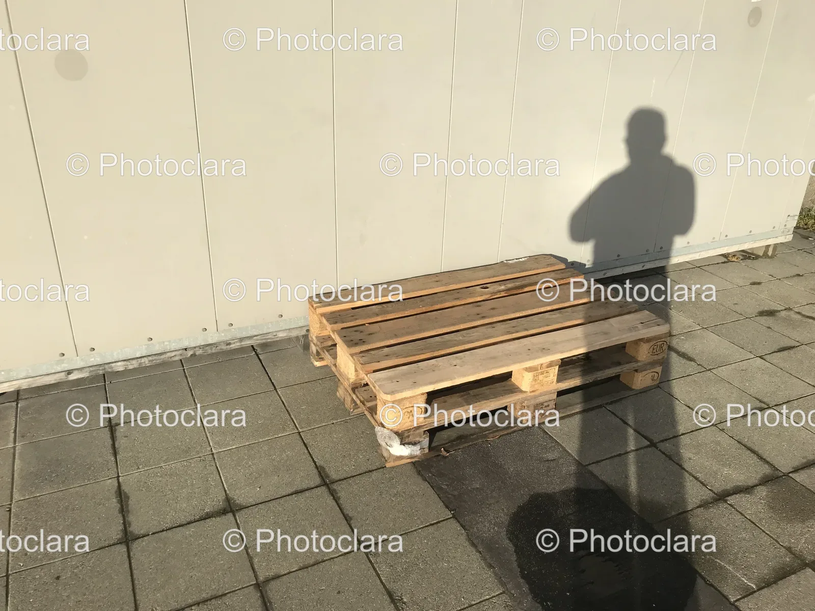 Shadow-of-a-Person-on-Wooden-Pallet.jpg