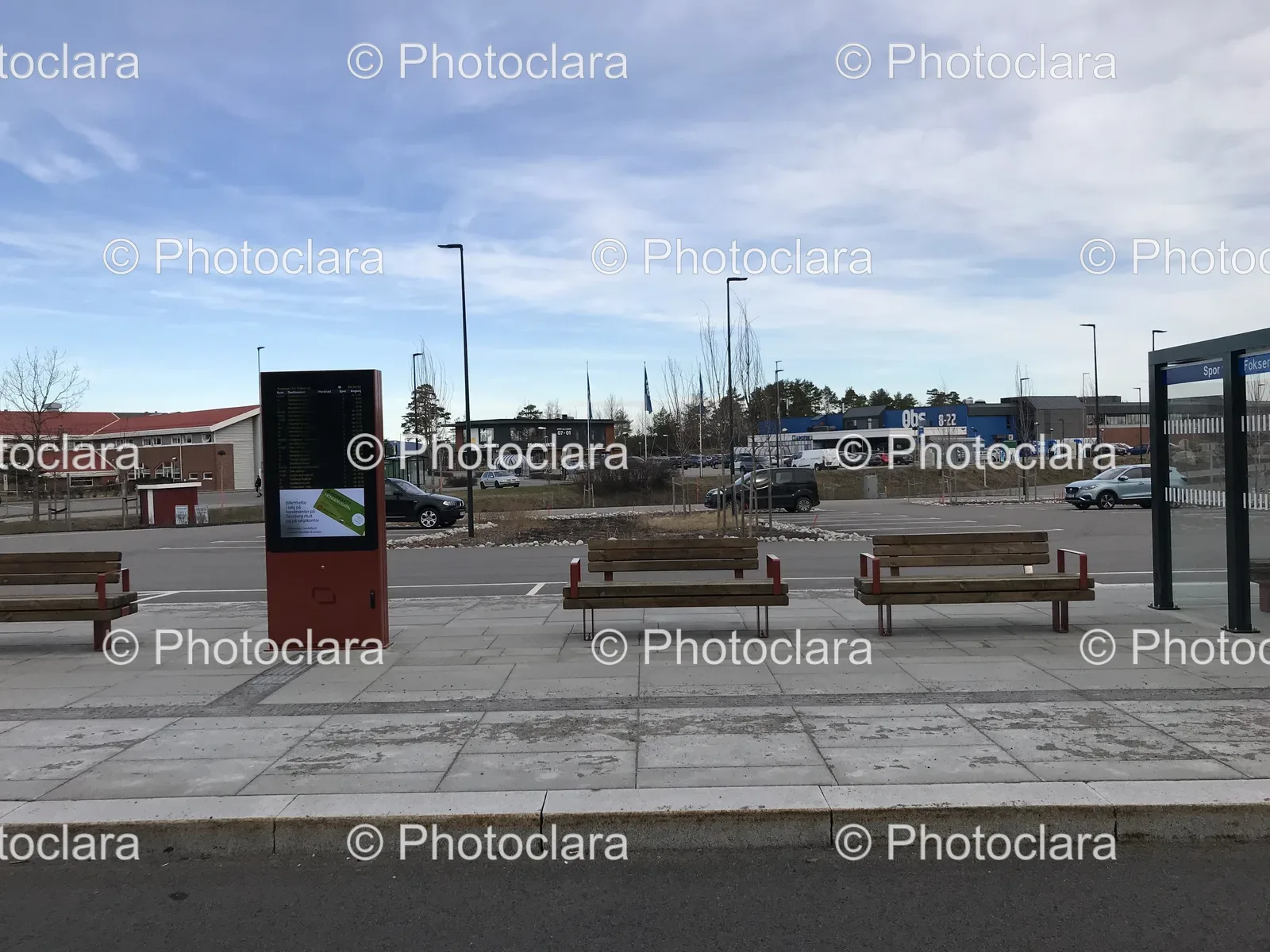 Parking-Lot-with-Benches-and-Sign.jpg