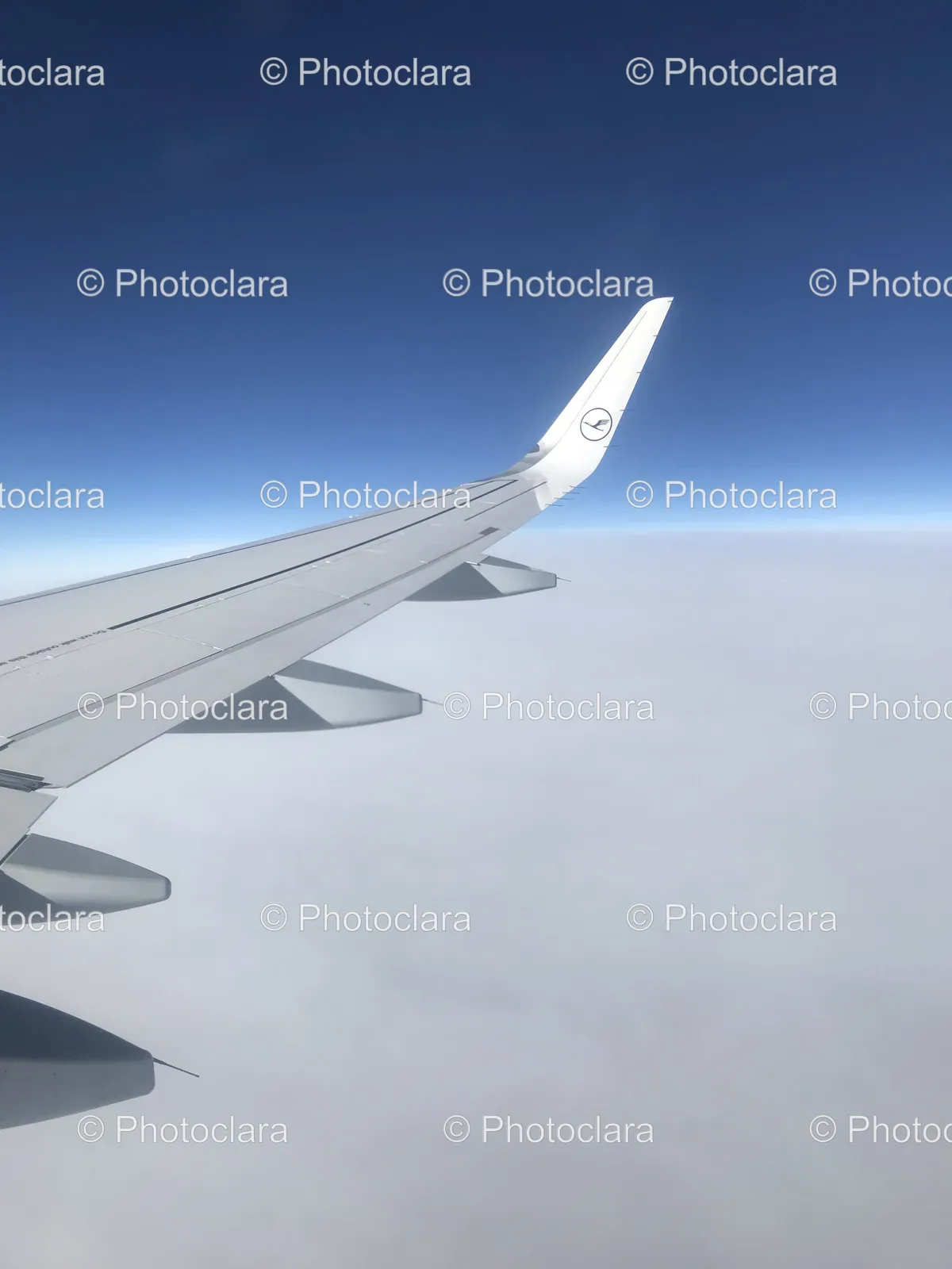 airplane-wing-in-the-sky.jpg