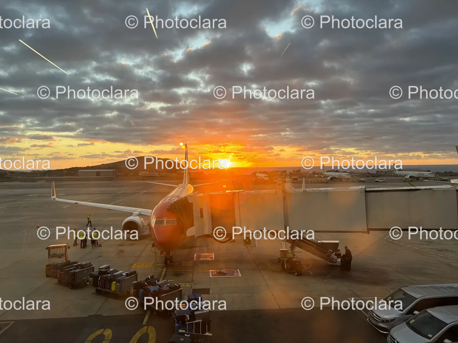 airport-runway-sunset-parked-airplane.jpg