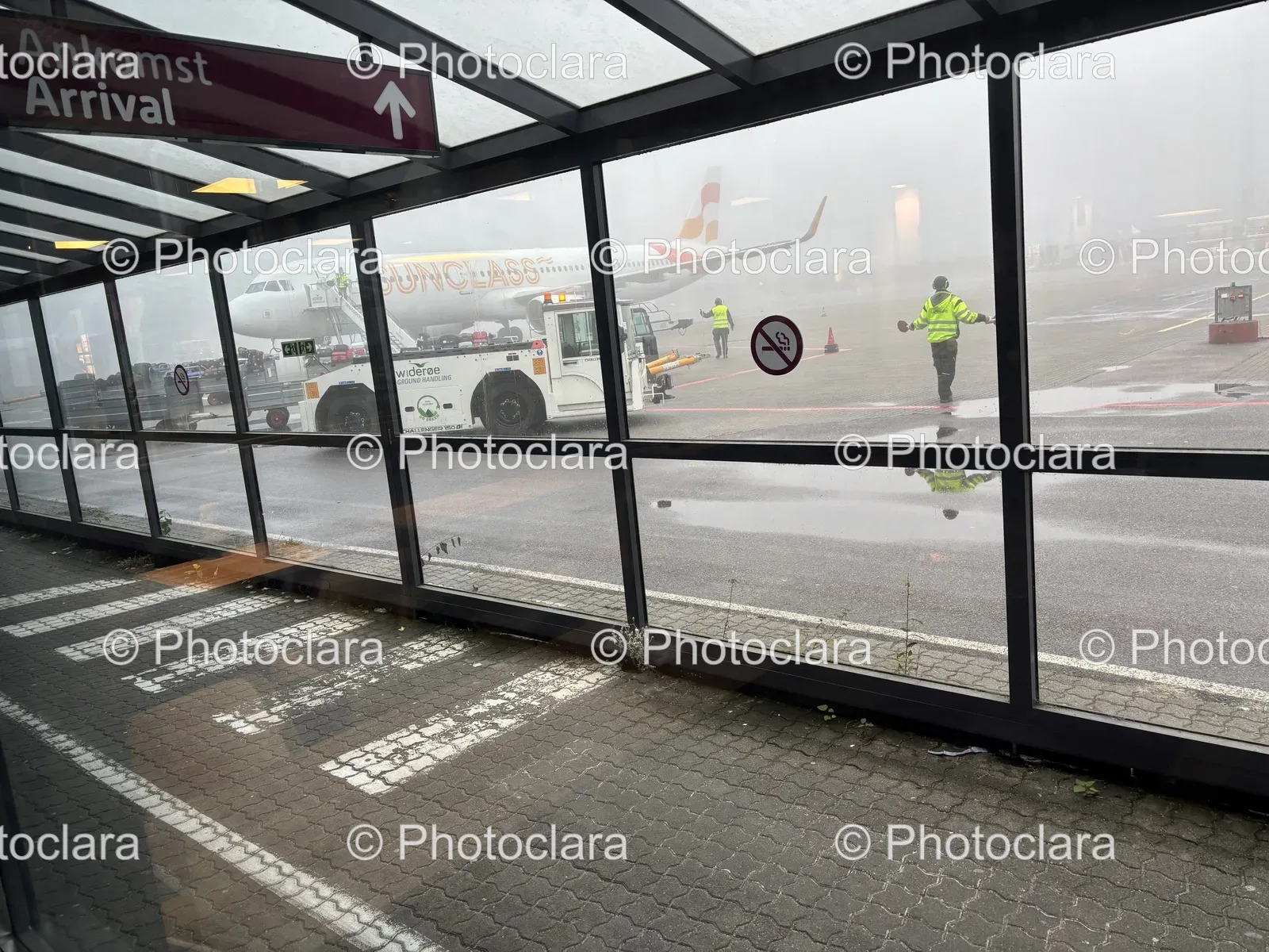 Modern-Glass-Terminal-with-Airplane-on-Tarmac.jpg
