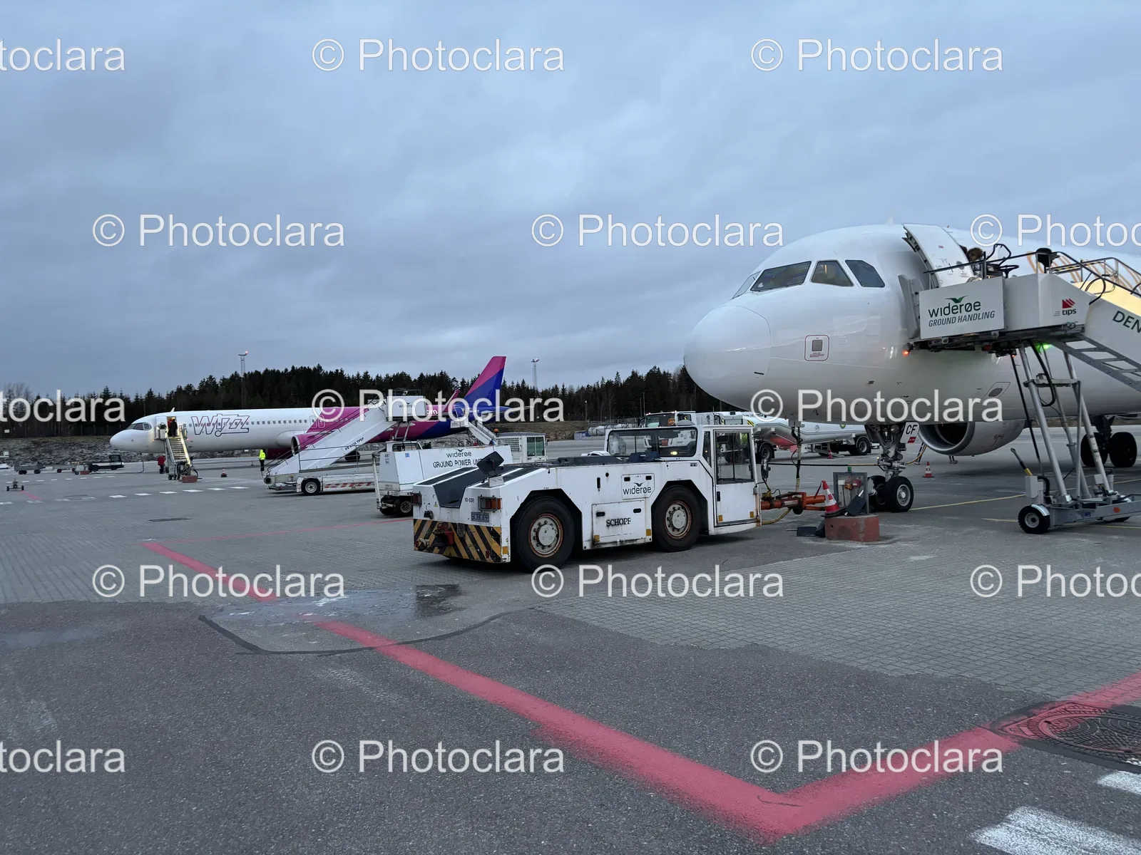 parked-wideroe-airplane-on-tarmac.jpg