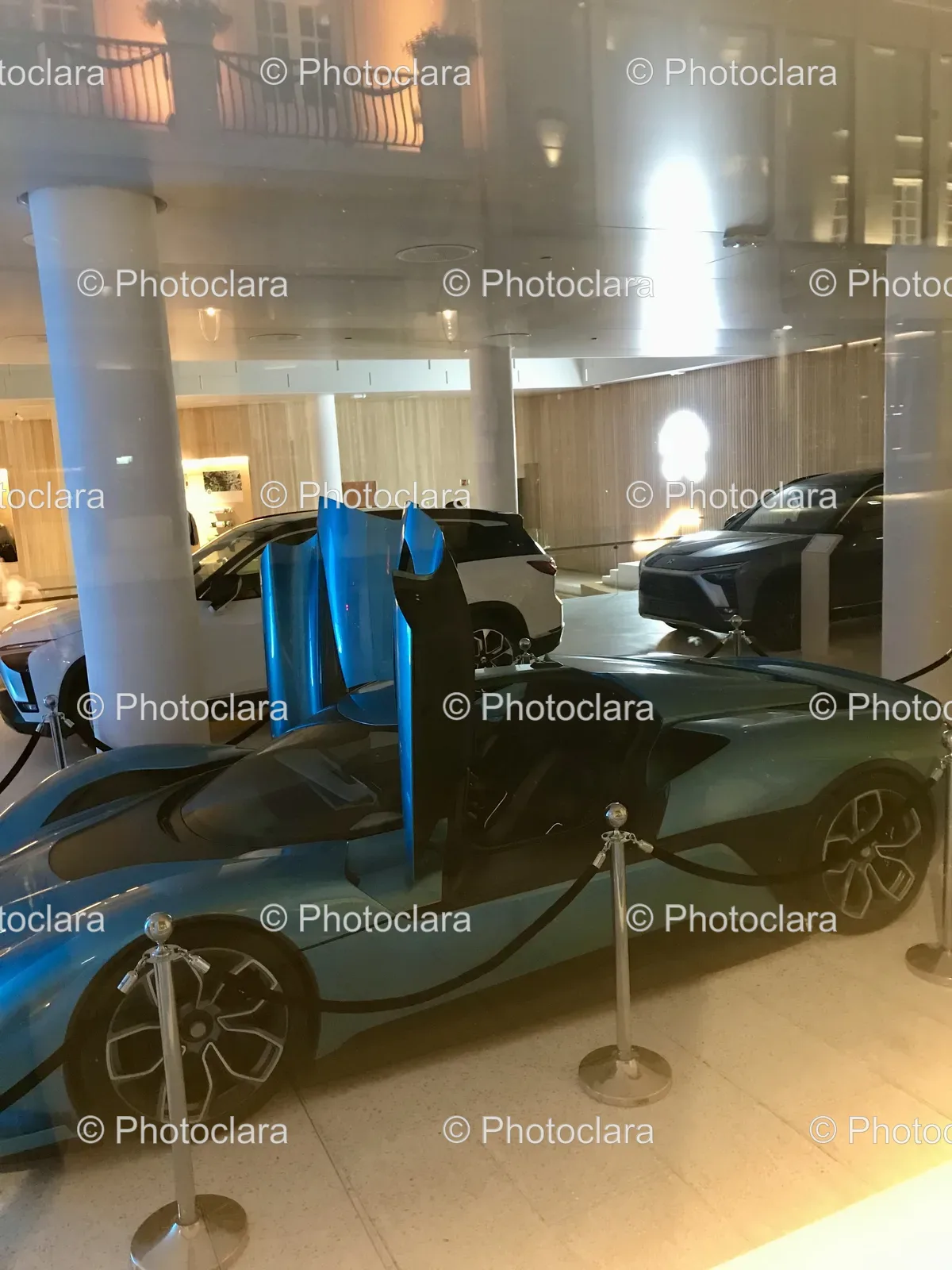 blue-sports-car-with-open-doors.jpg