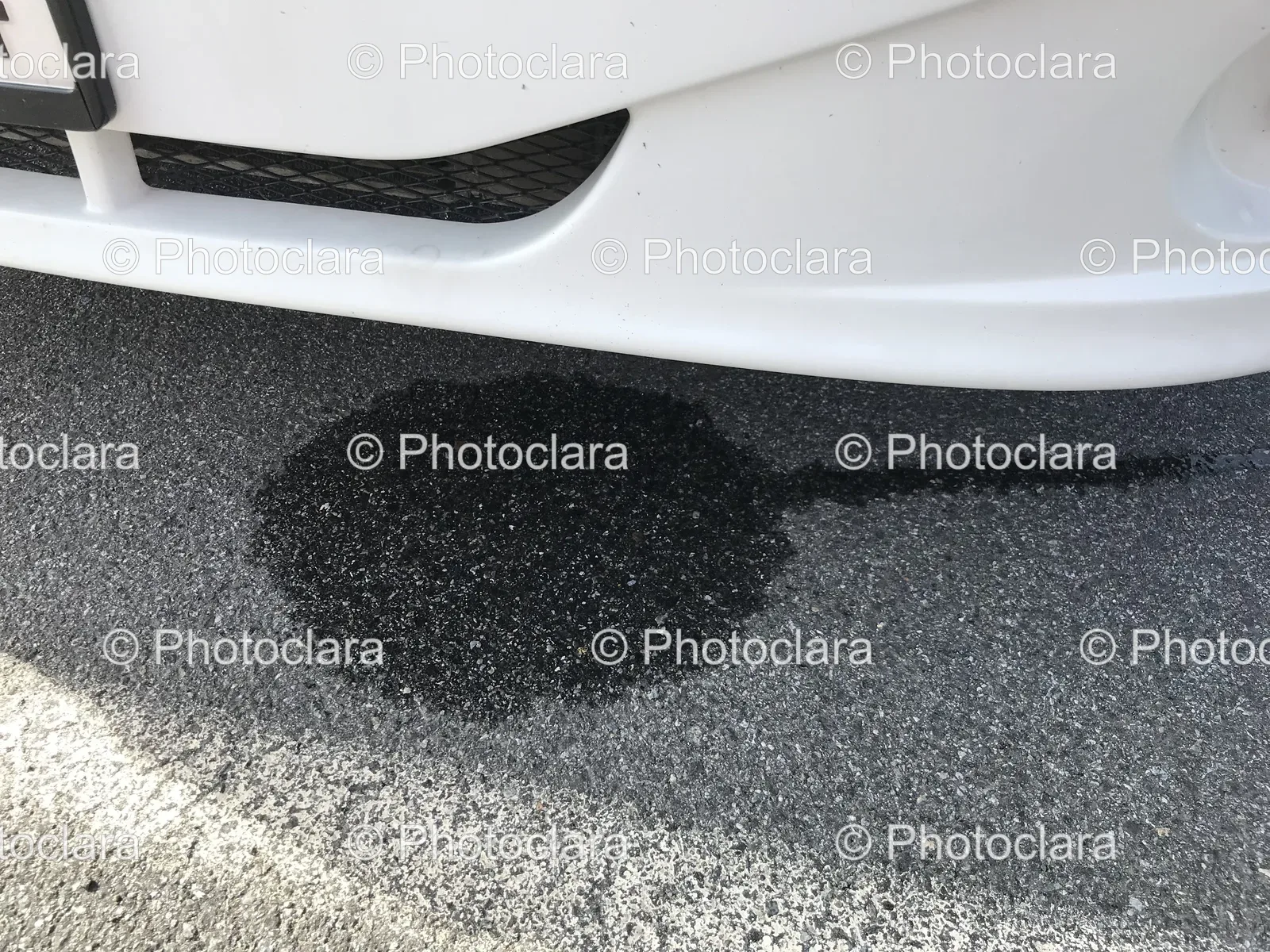 Oil-Puddle-on-Ground.jpg