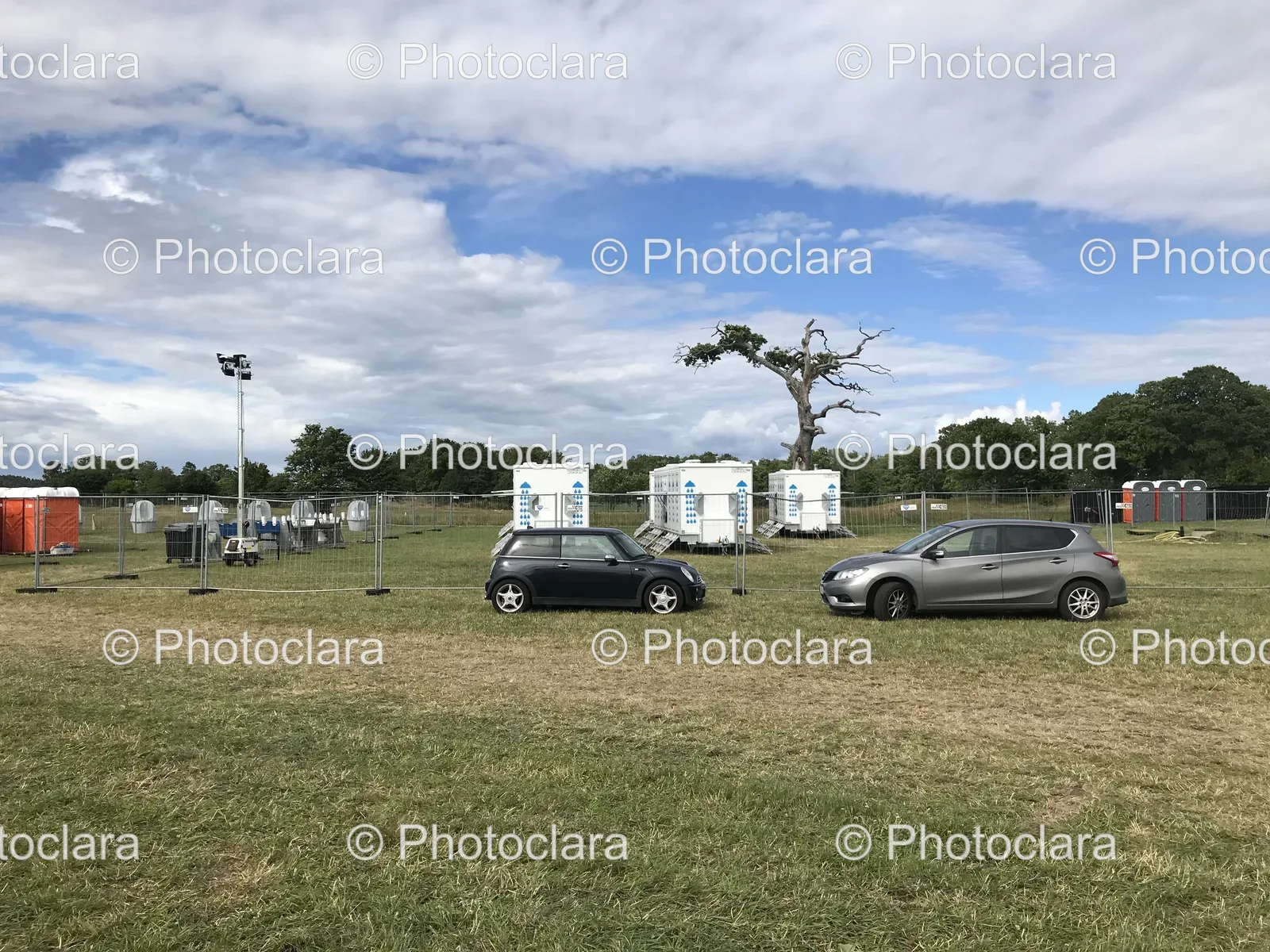 cars-parked-in-a-field.jpg