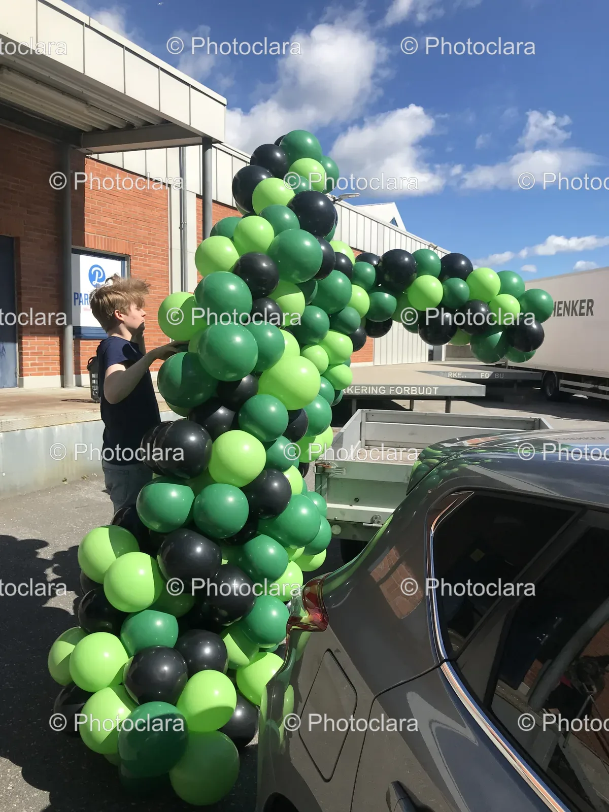 child-standing-next-to-car-sunny-day.jpg