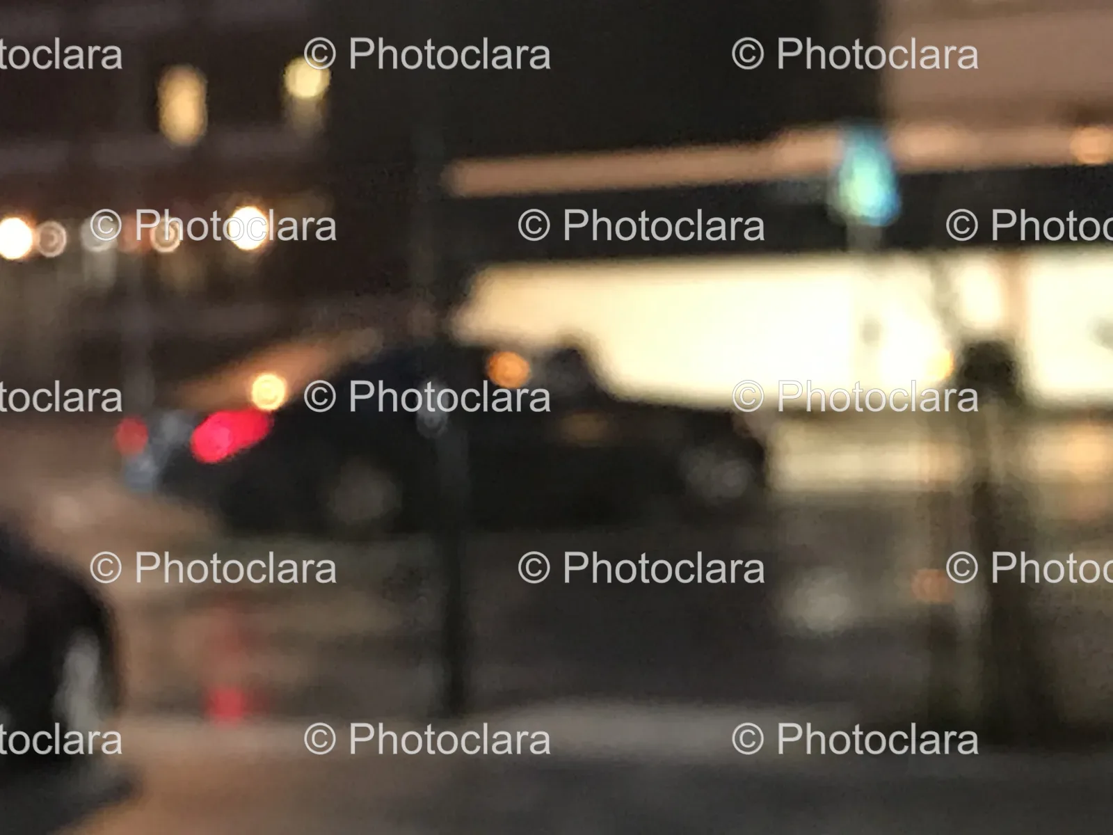 blurry-car-on-wet-street-night.jpg