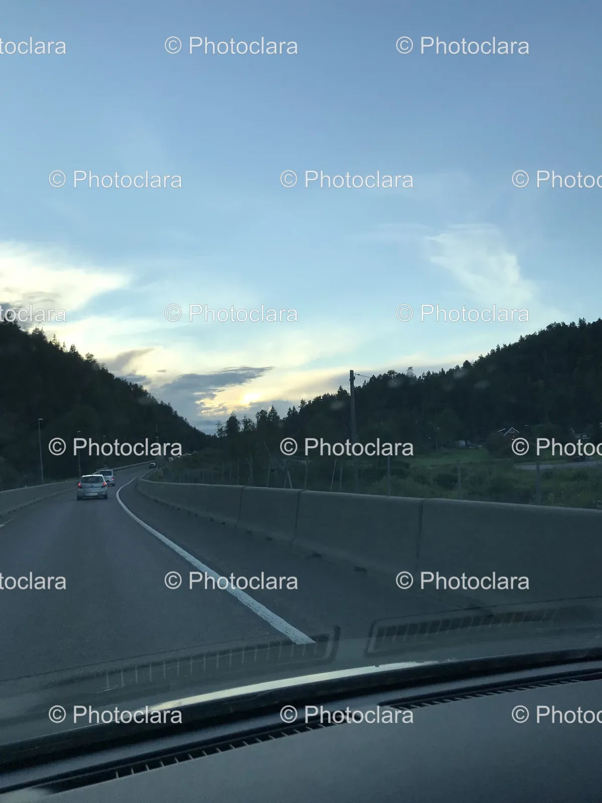 car-driving-on-scenic-road.jpg
