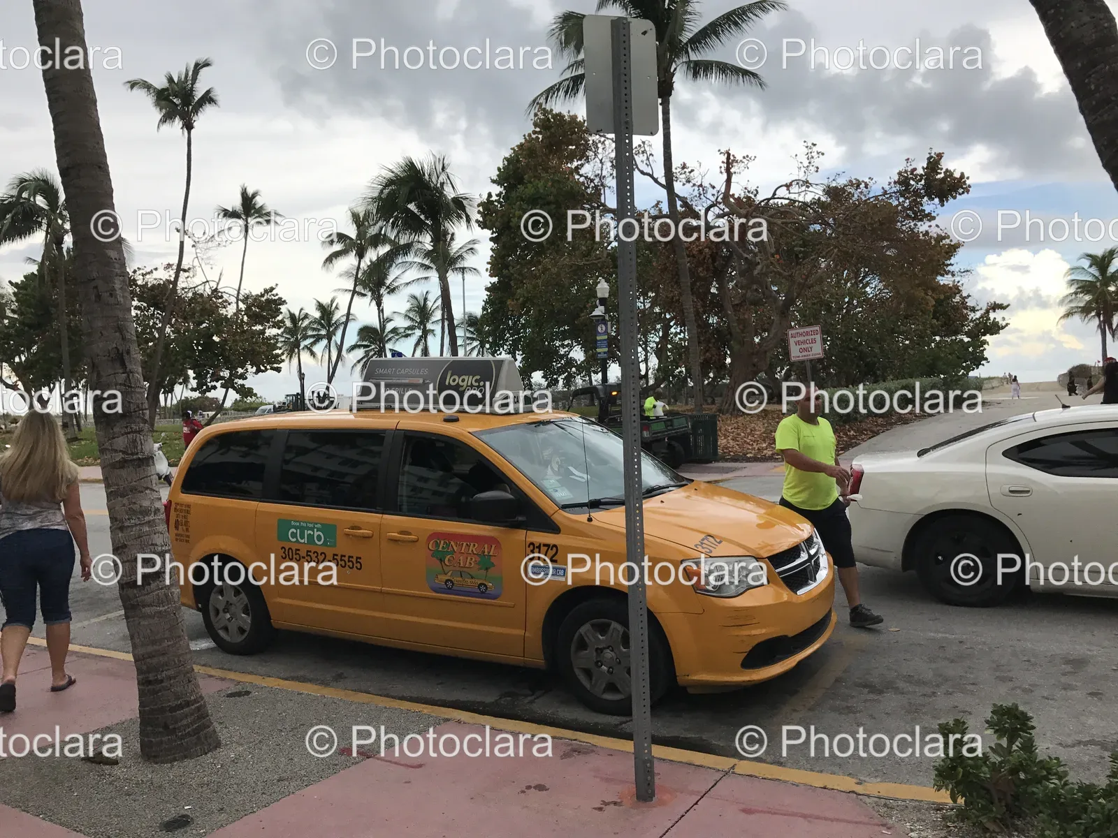 Yellow-Taxi-Parked-on-Street.jpg