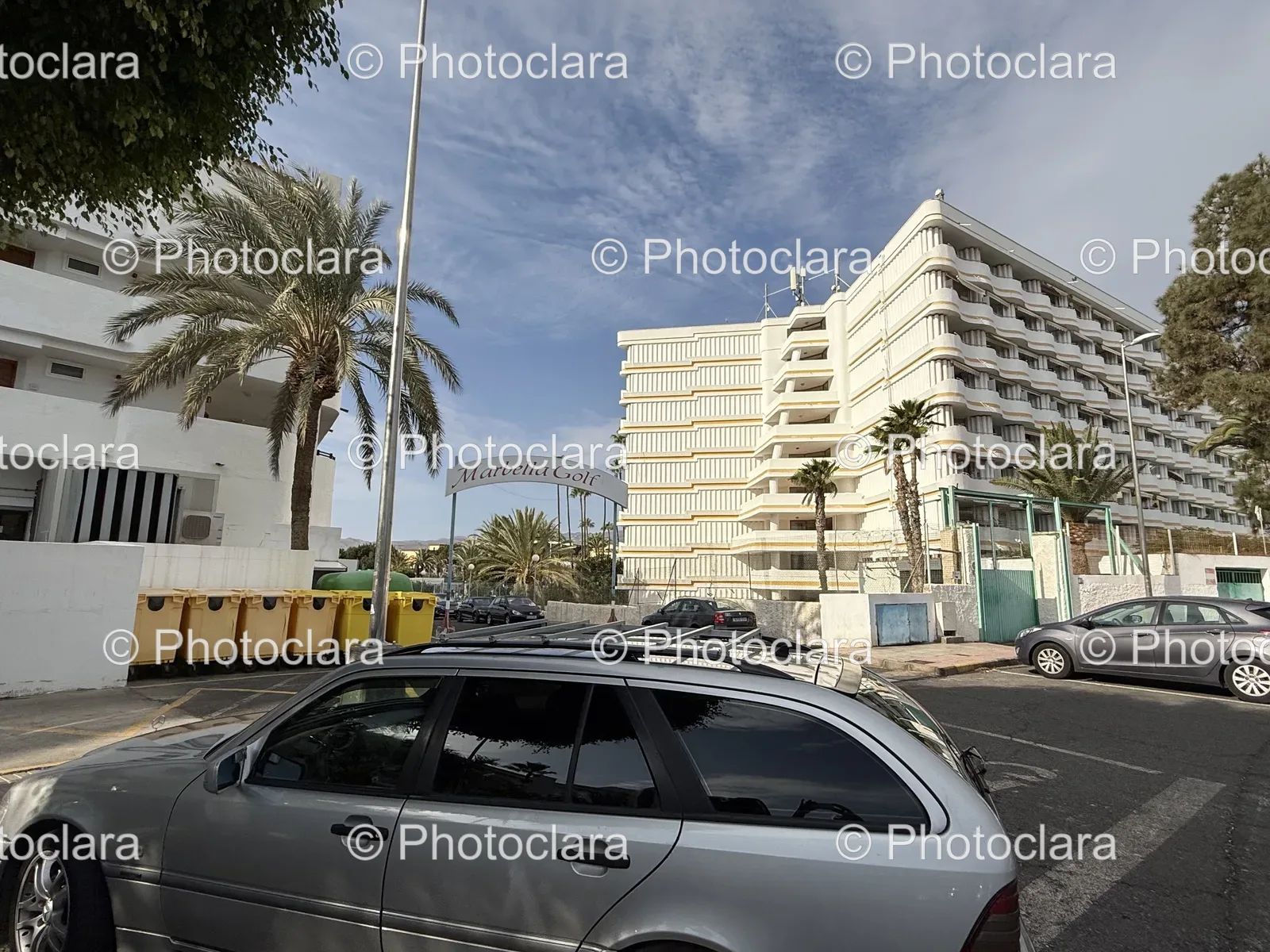 Luxury-Car-Parked-in-Urban-Setting.jpg