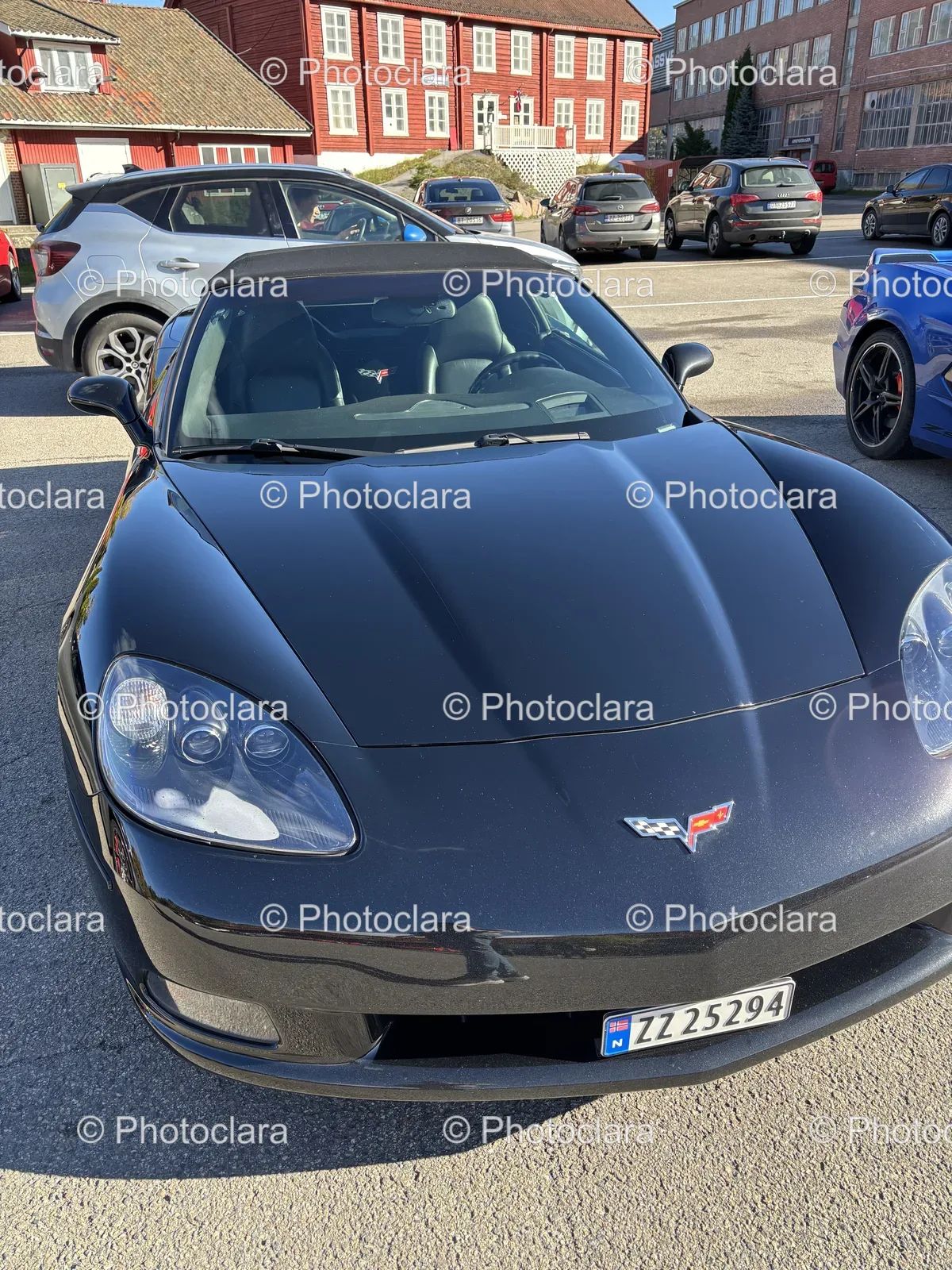 Black-Sports-Car-in-Parking-Lot.jpg