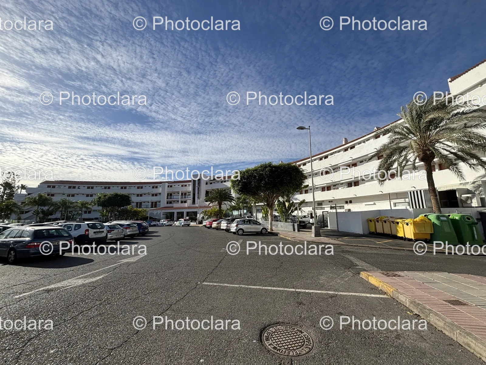 cars-in-urban-parking-lot.jpg
