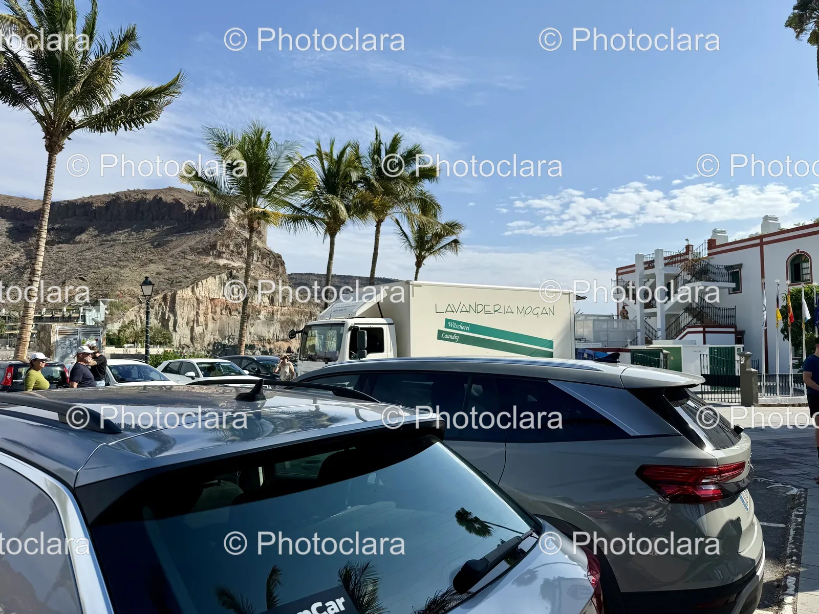 cars-parked-in-lot-near-laundry-service.jpg