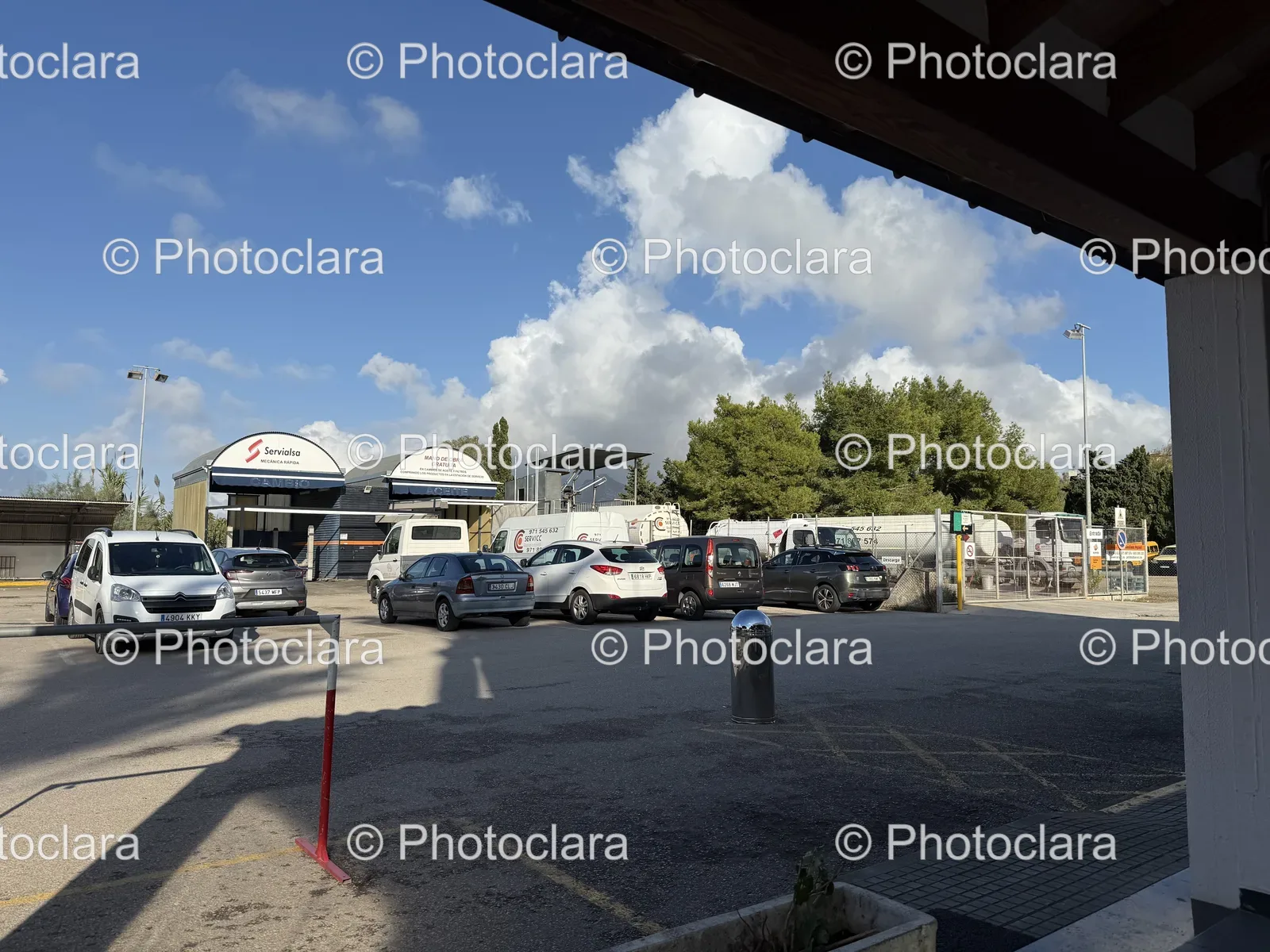 mixed-vehicles-and-tents-in-a-parking-lot.jpg