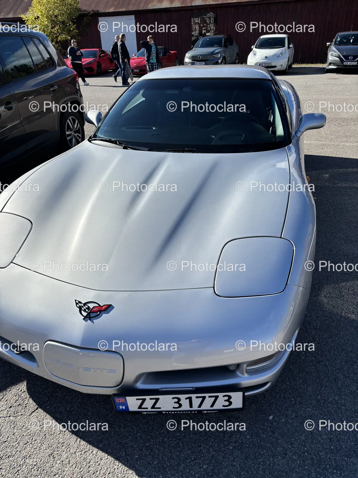 Silver-Sports-Car-in-Parking-Lot.jpg