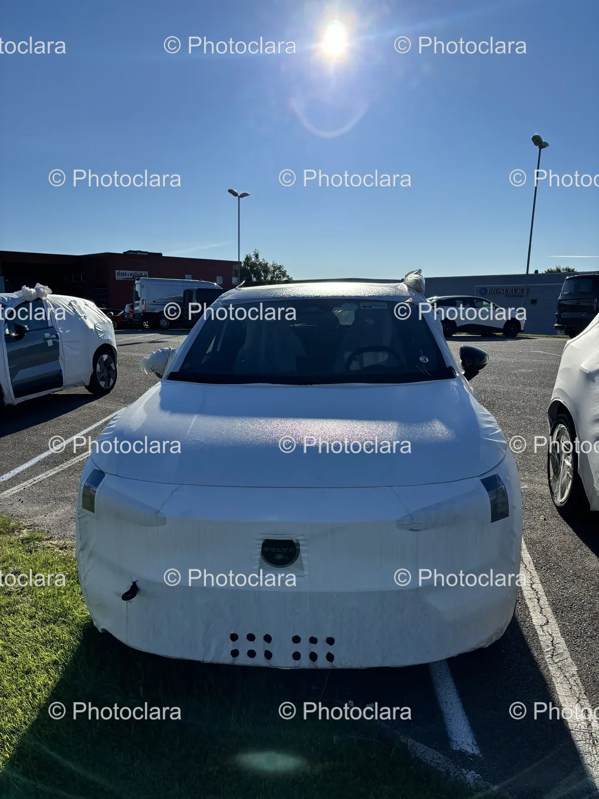 white-car-parked-in-a-lot.jpg