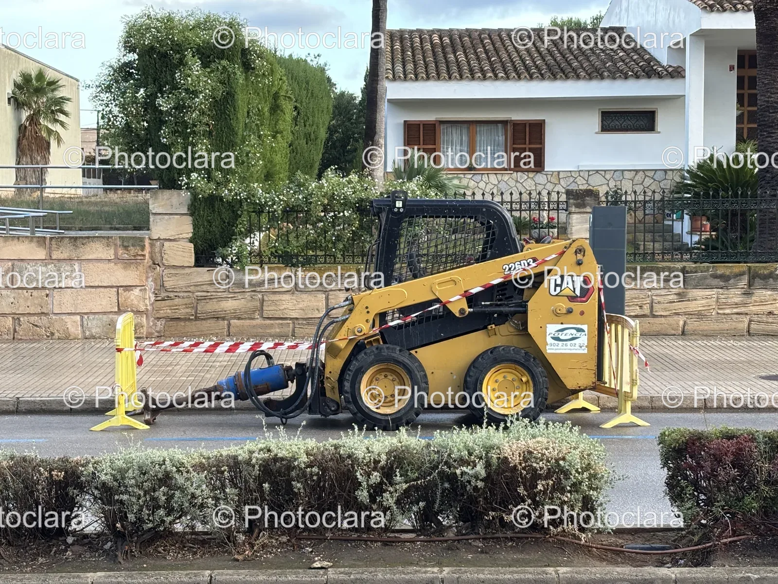 Yellow-Construction-Machine-on-Urban-Street.jpg
